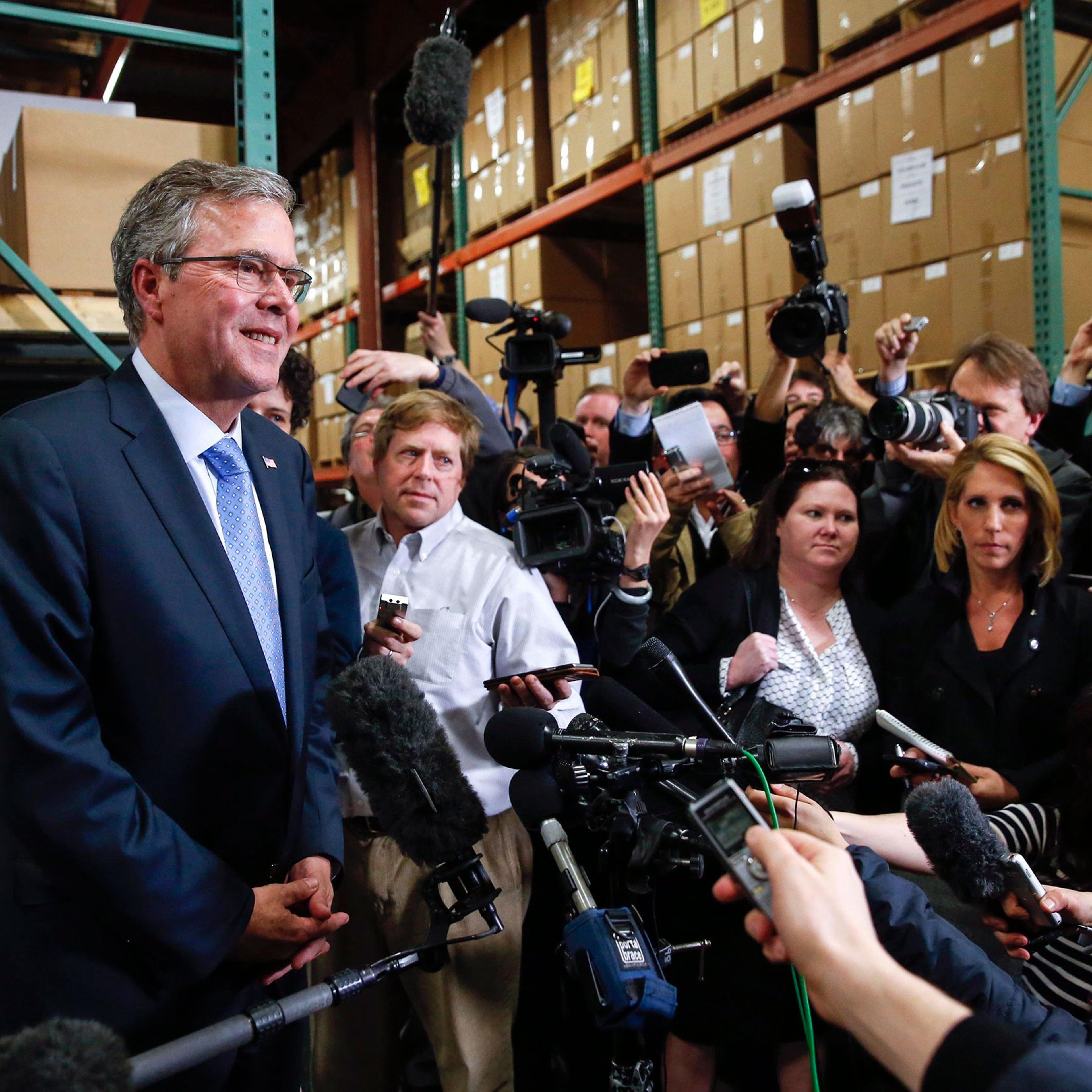 Former Florida Governor Jeb Bush speaks to the media after visiting Integra Biosciences during a campaign stop in Hudson, New Hampshire