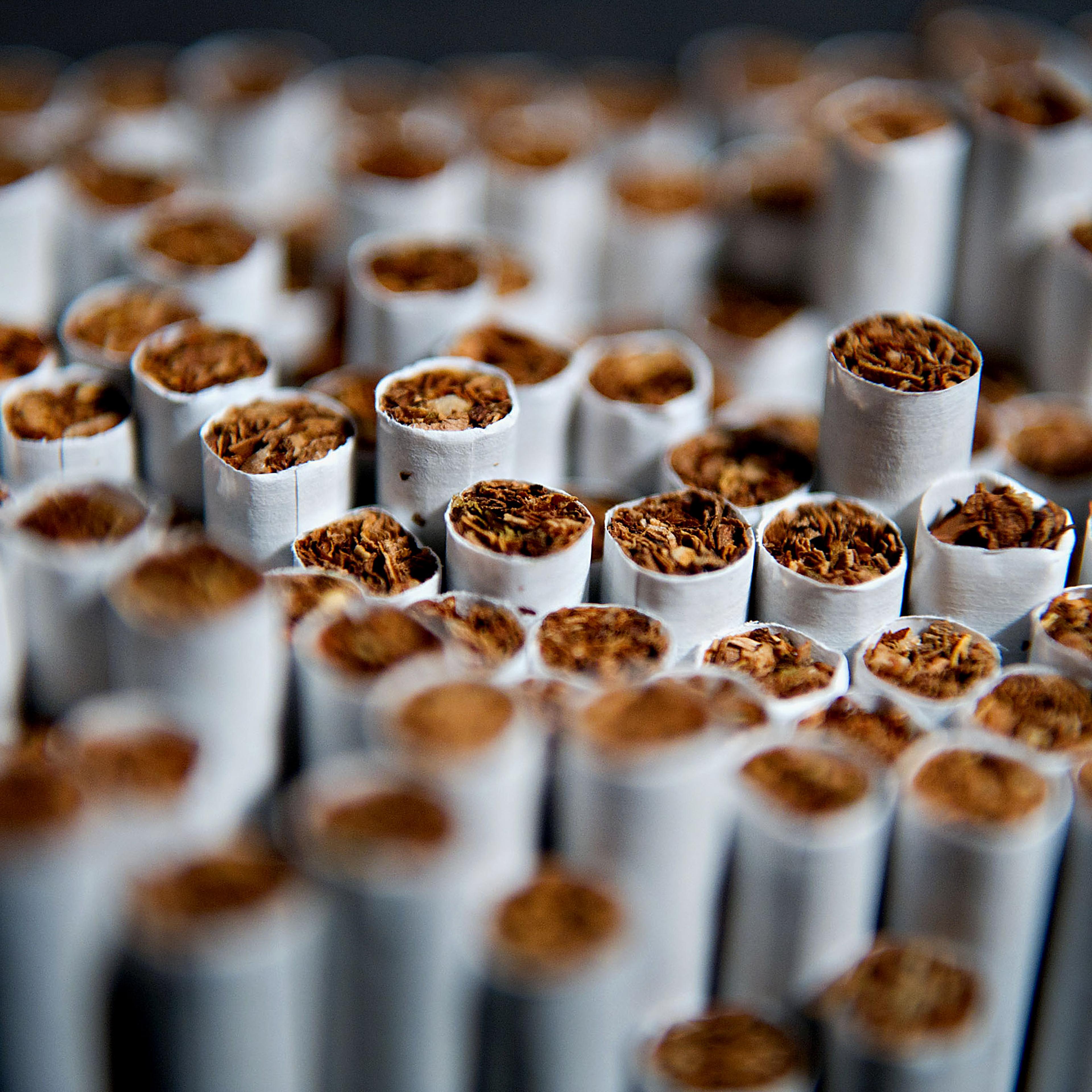 Several brands of cigarettes are arranged for a photograph in Tiskilwa, Illinois, U.S., on April 17, 2012.