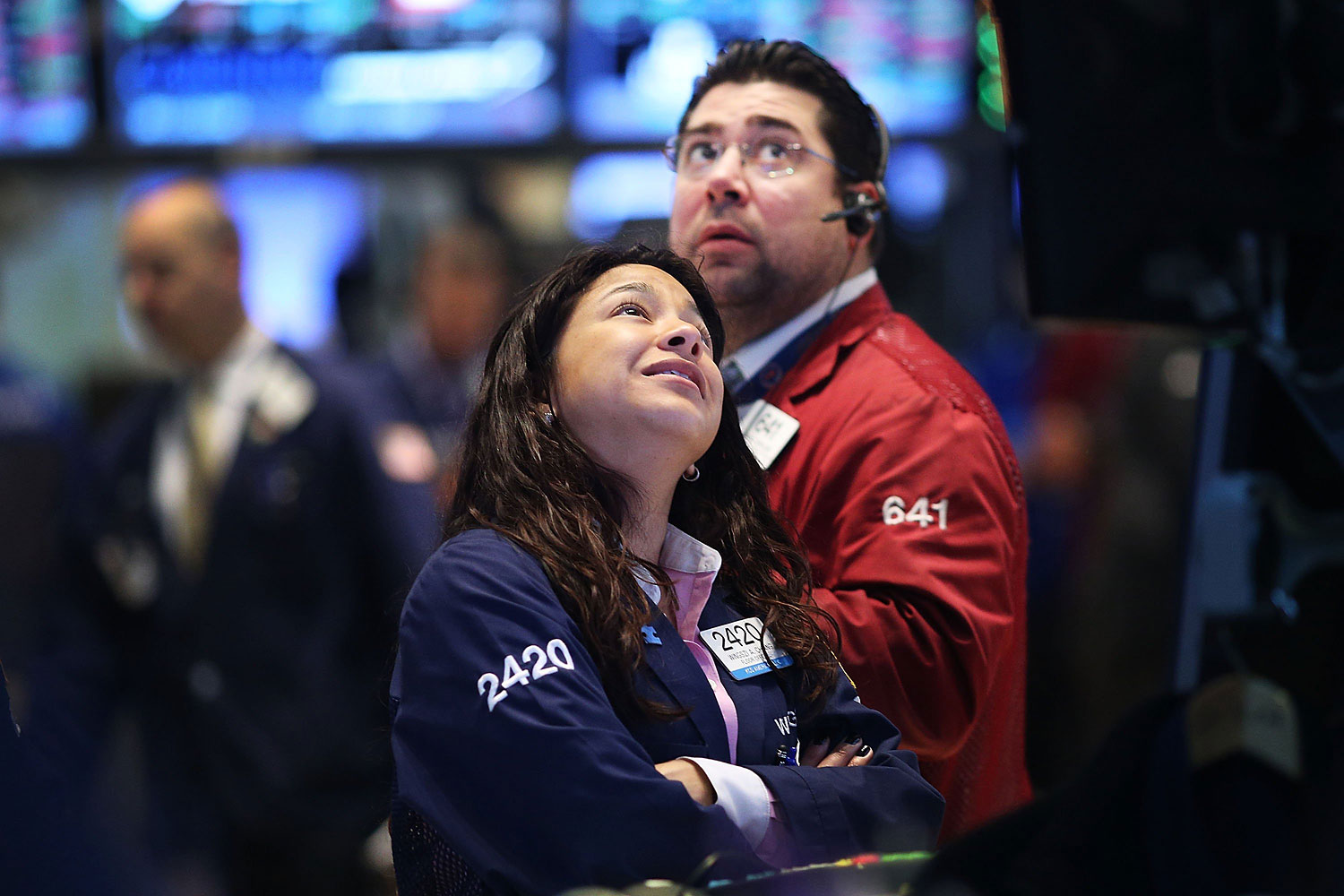 Traders work on the floor of the New York Stock Exchange in New York City. 