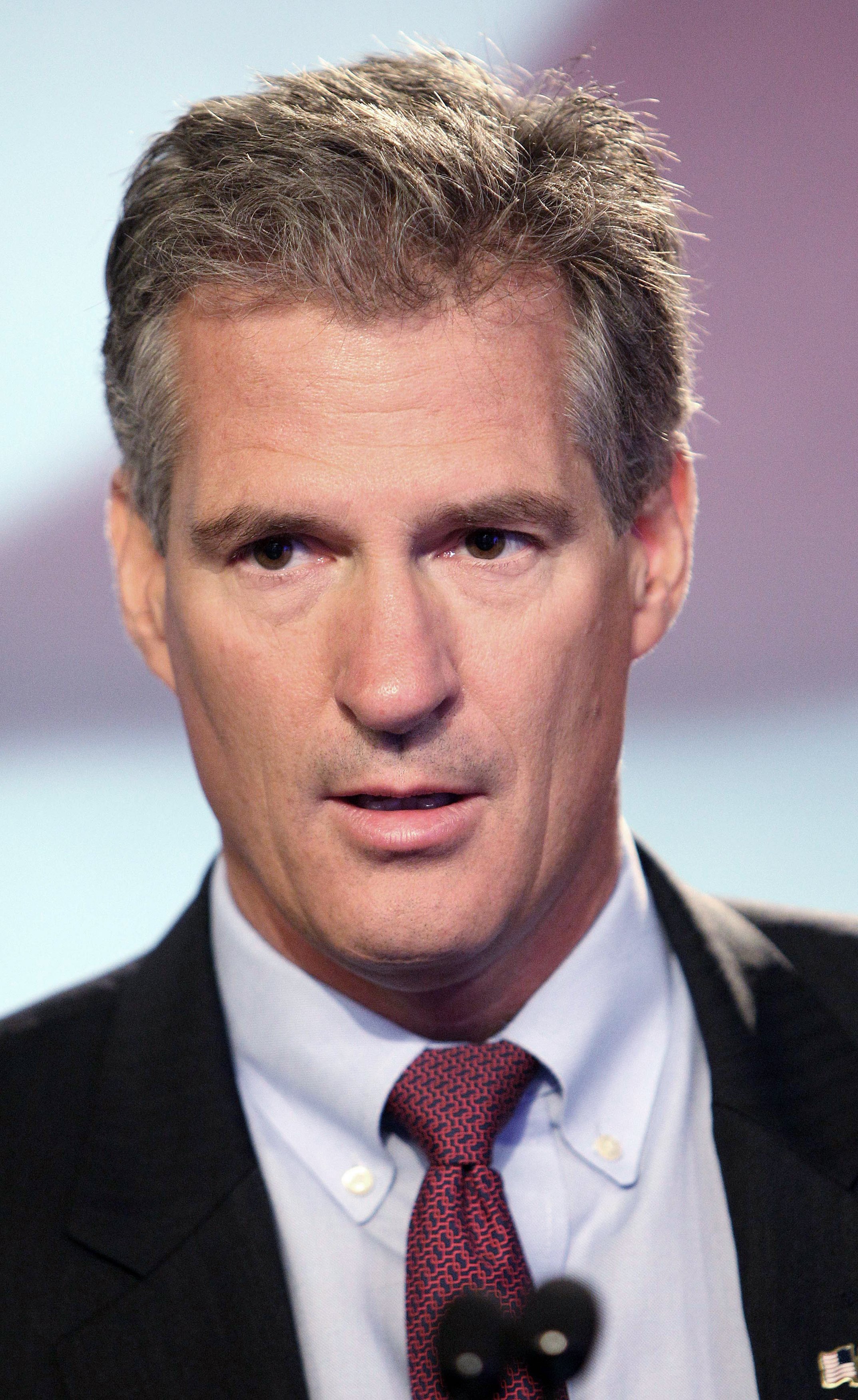 Former Republican U.S. Sen. of Mass. Scott Brown waits before a televised debate on Sept. 4, 2014 at WMUR in Manchester, N.H.