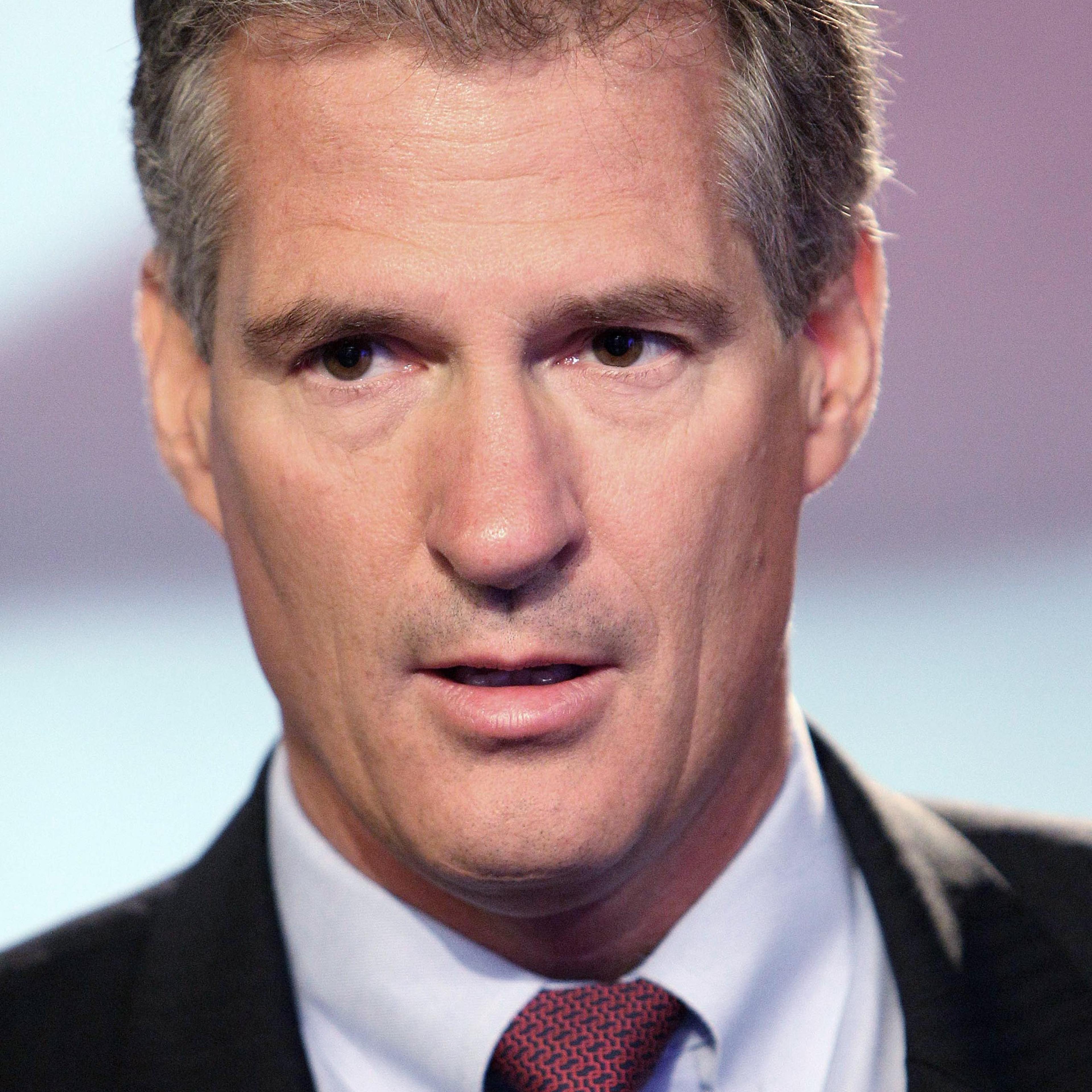 Former Republican U.S. Sen. of Mass. Scott Brown waits before a televised debate on Sept. 4, 2014 at WMUR in Manchester, N.H.