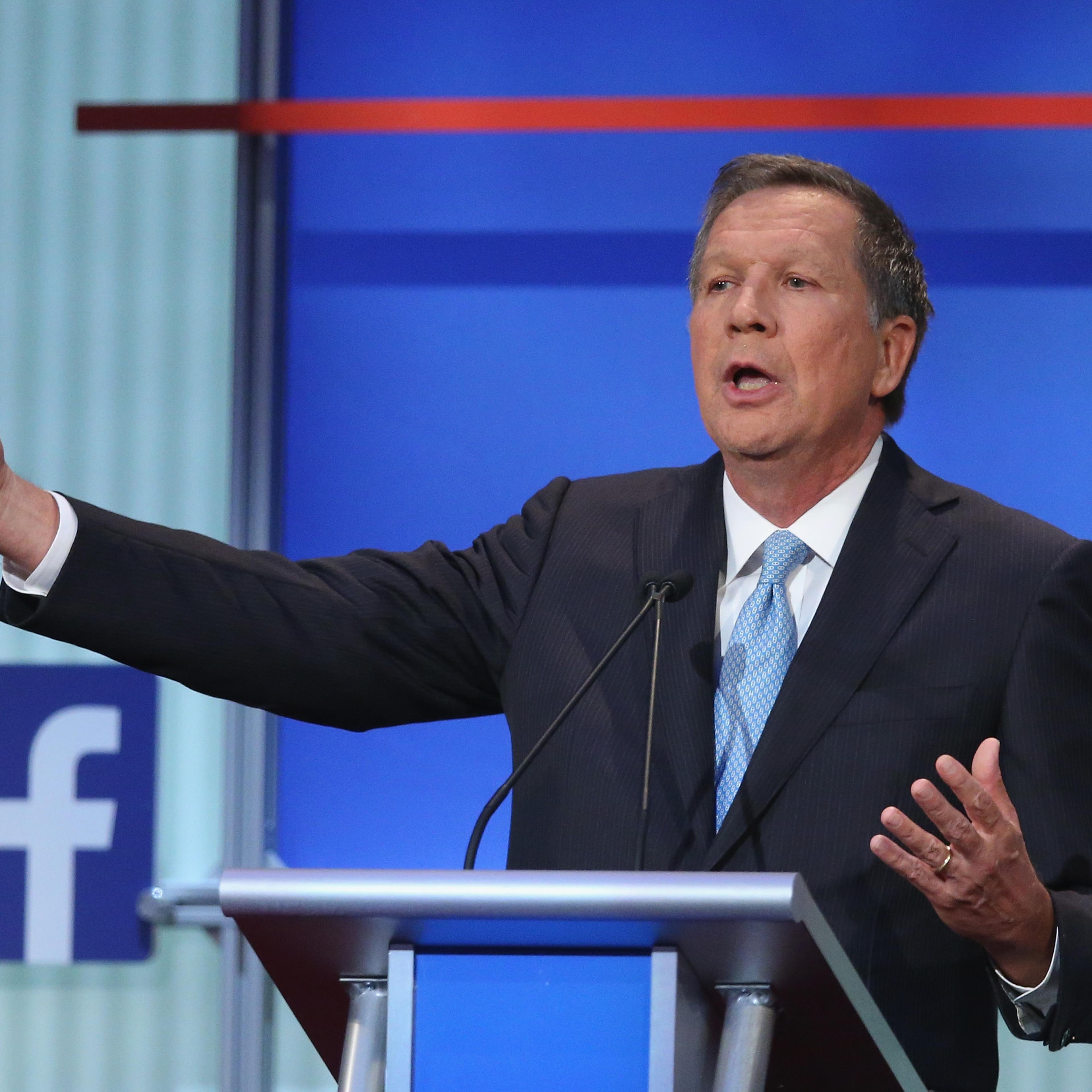 Republican presidential candidate Ohio Gov. John Kasich fields a question during the first Republican presidential debate hosted by Fox News and Facebook at the Quicken Loans Arena in Cleveland, Ohio, on Aug. 6, 2015.