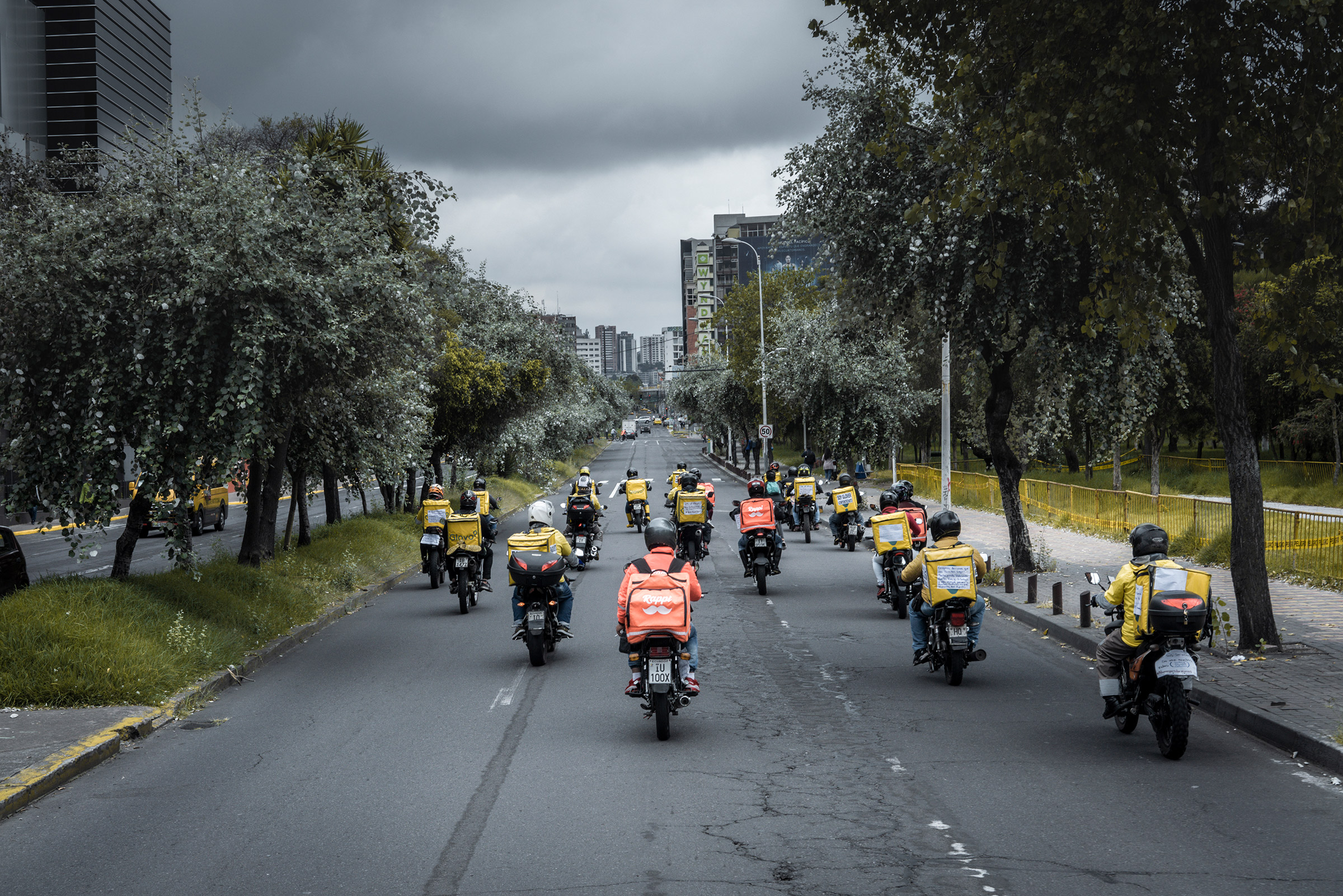 Delivery drivers driving in an empty avenue during a global drivers protest on May 29th in Quito, Ecuador Drivers from eleven countries, most of them in Latin America, protested under the motto "I wont deliver" They demad fair payments and securities for