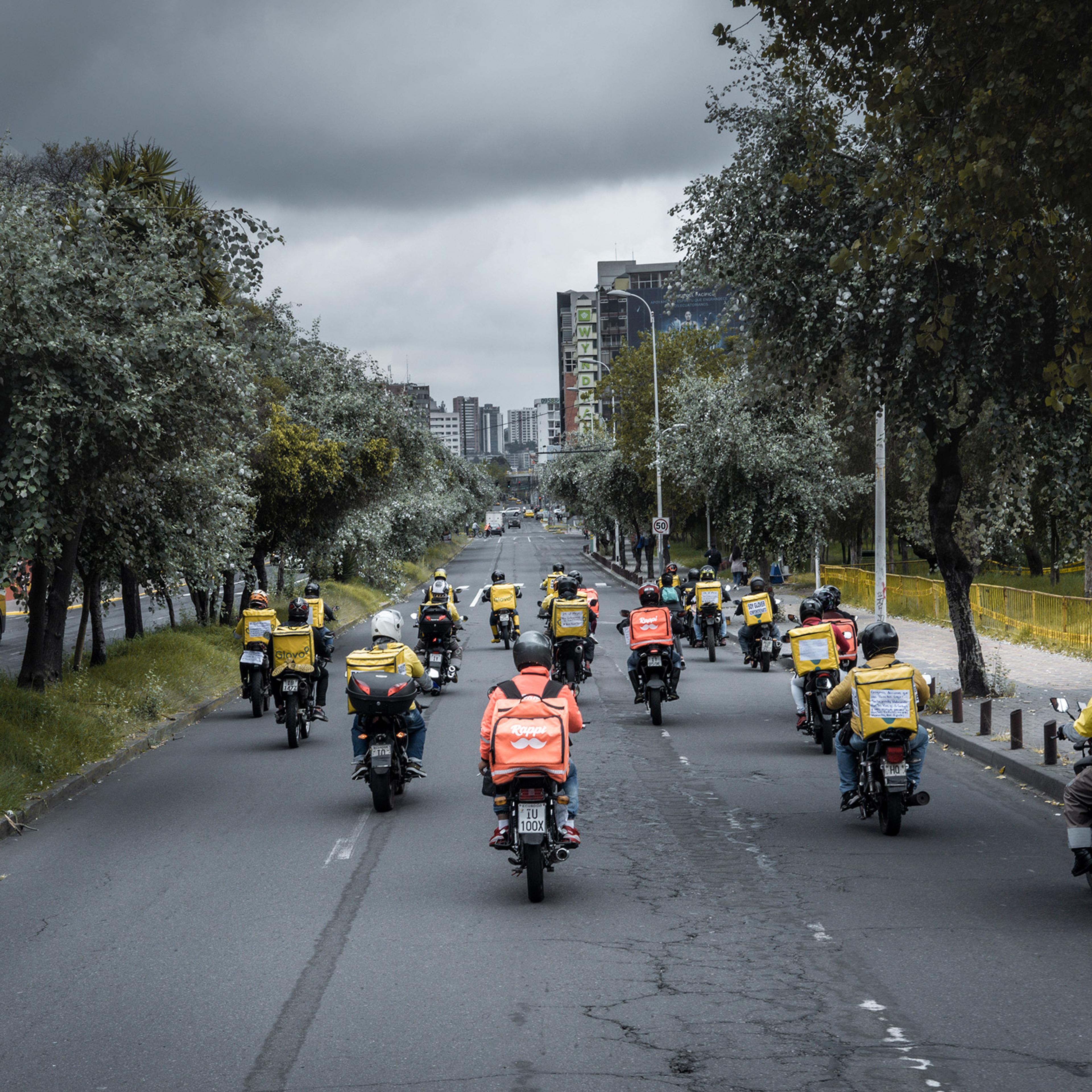 Delivery drivers driving in an empty avenue during a global drivers protest on May 29th in Quito, Ecuador Drivers from eleven countries, most of them in Latin America, protested under the motto "I wont deliver" They demad fair payments and securities for