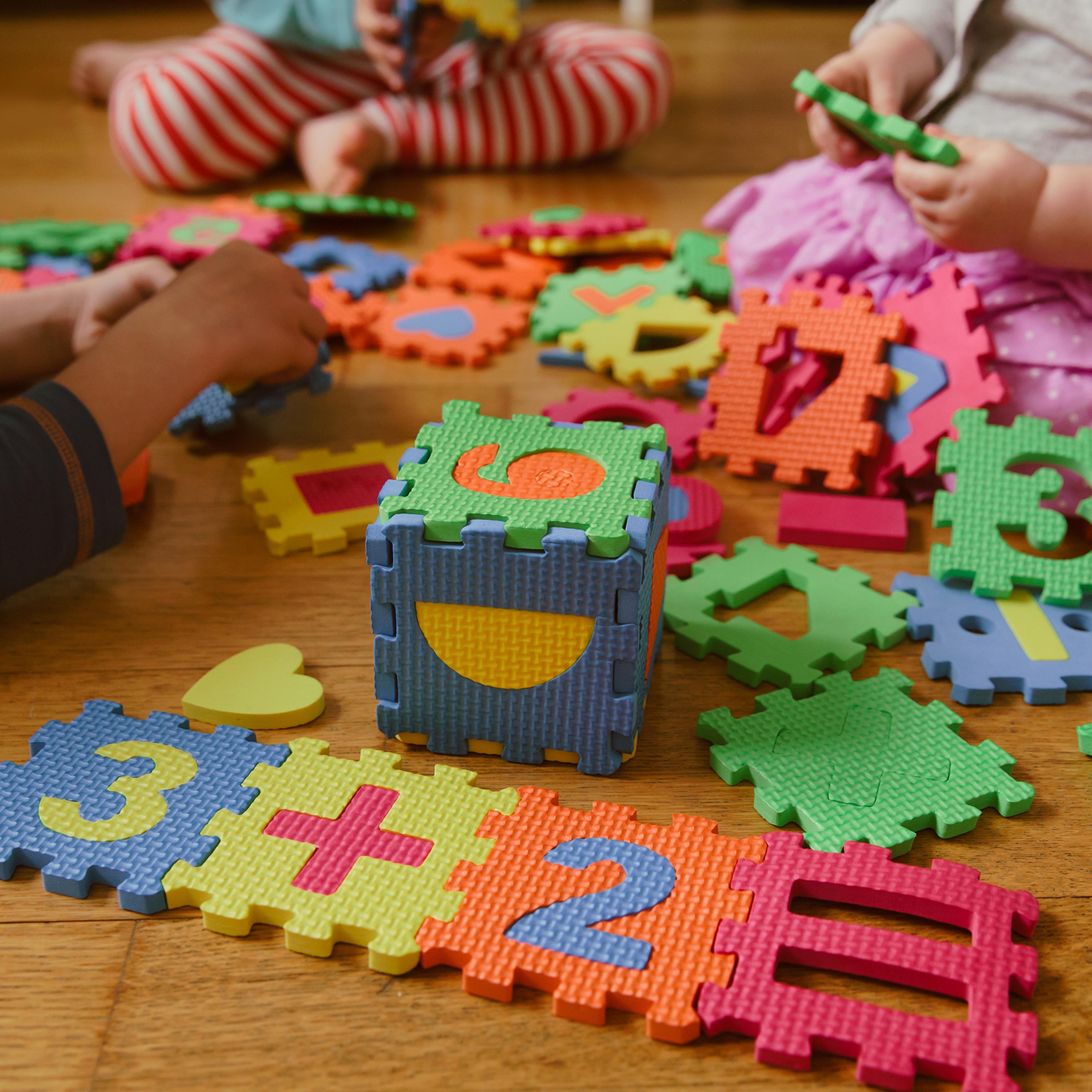 kids playing with puzzle, education concept