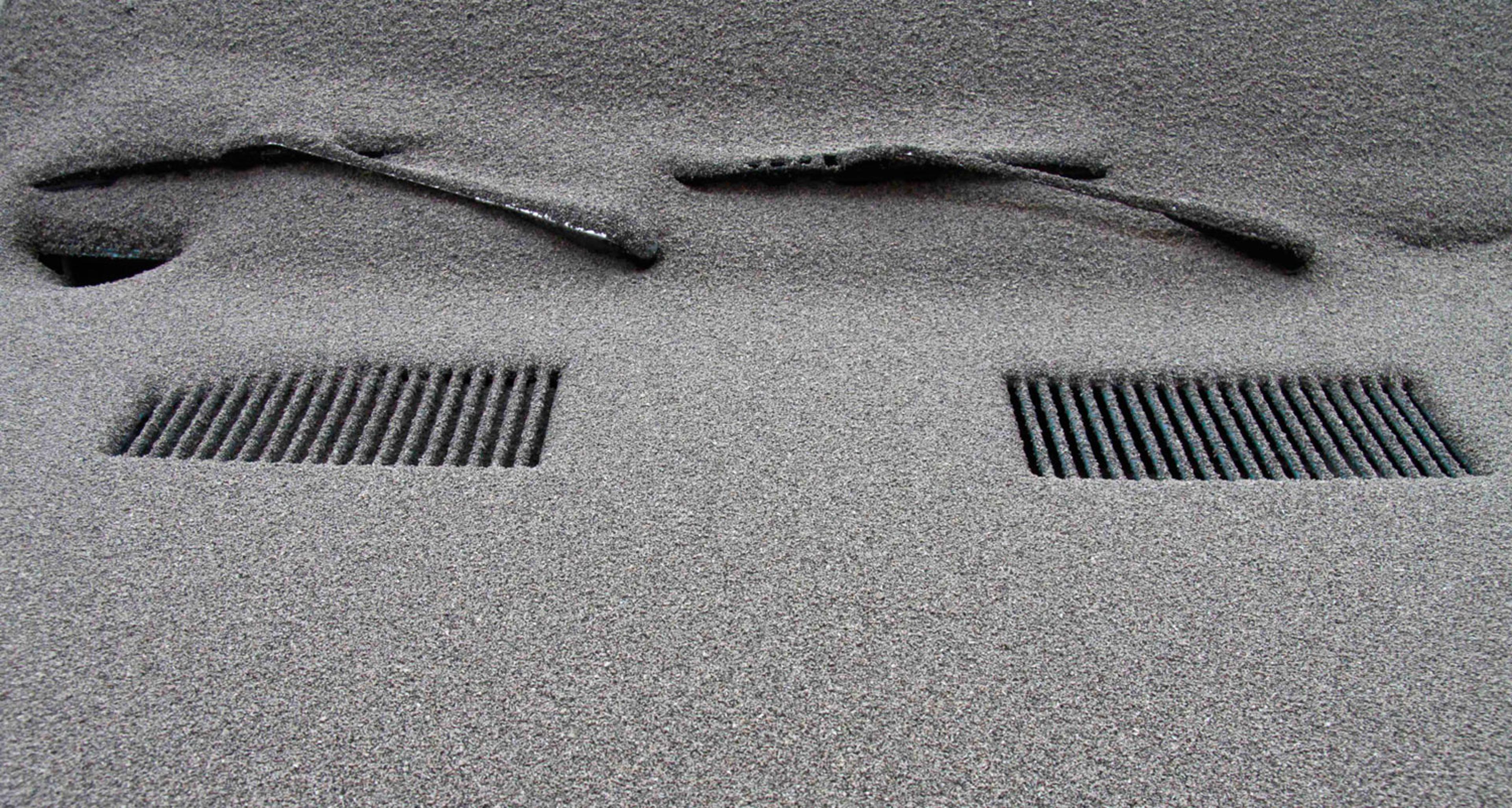 A car is completely covered in volcanic ash in San Carlos de Bariloche, southern Argentina, June 5, 2011.