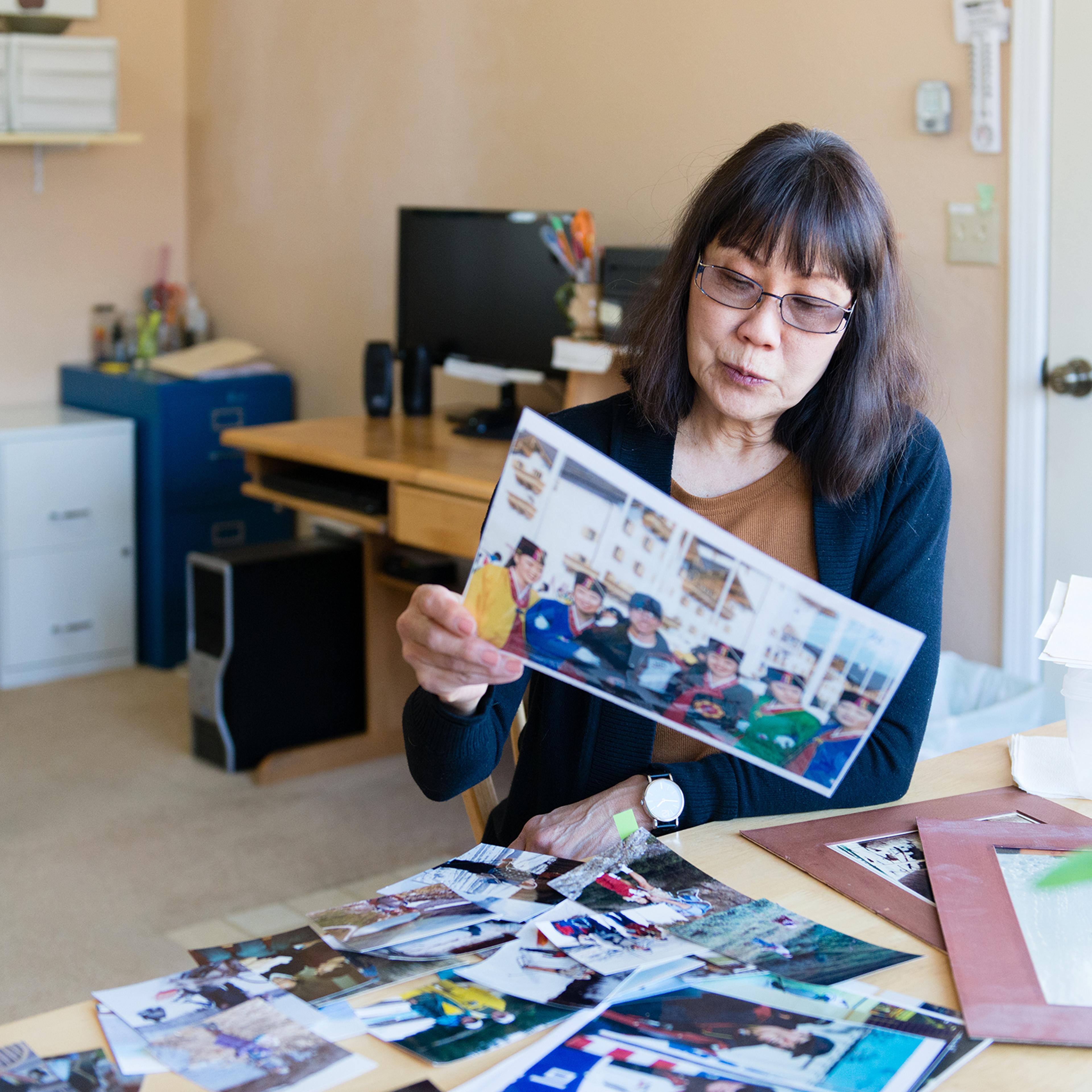 Patricia Martin goes through old photographs of her husband Robert, who died from prostate cancer in 2014.