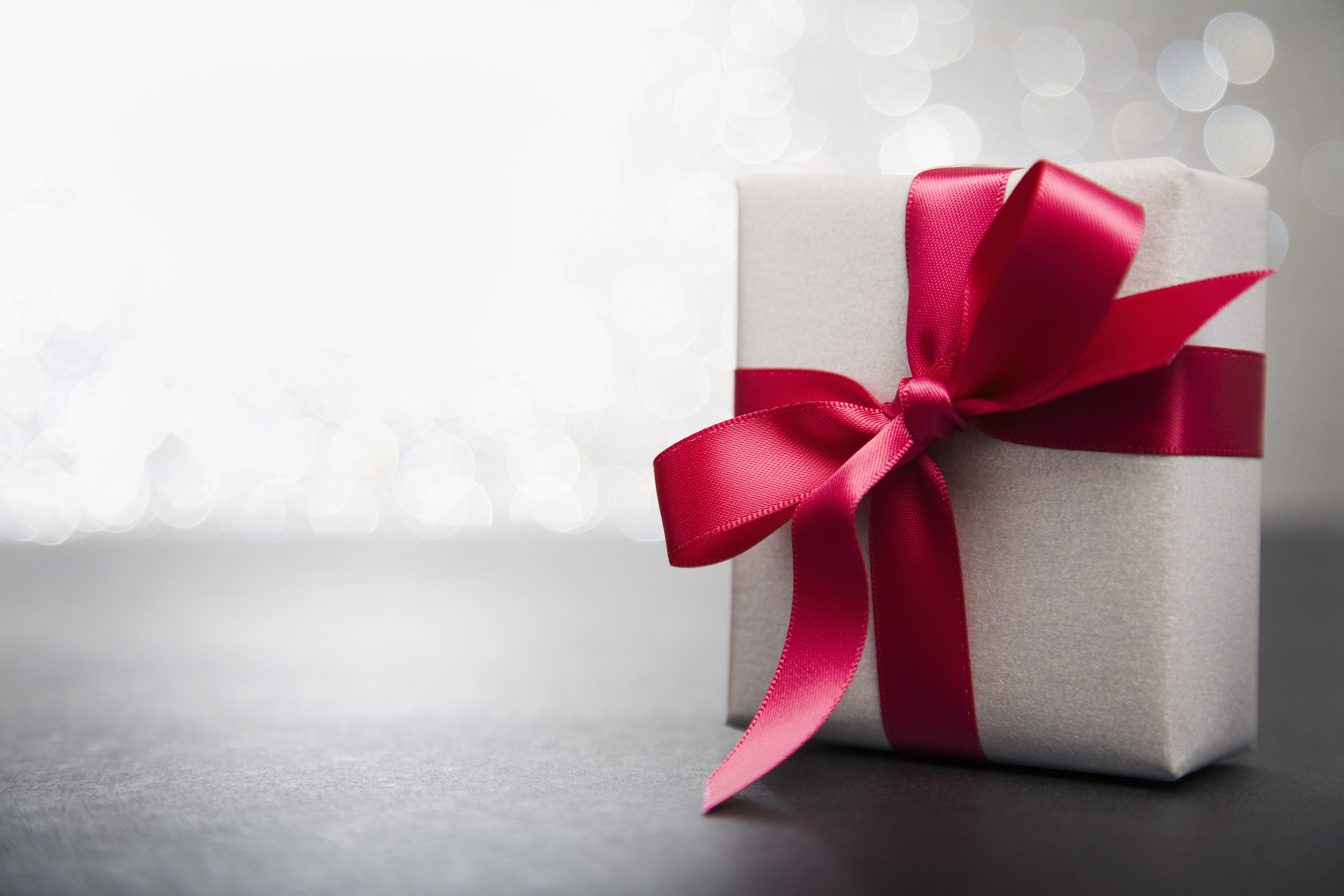 Wrapped gift with red ribbon