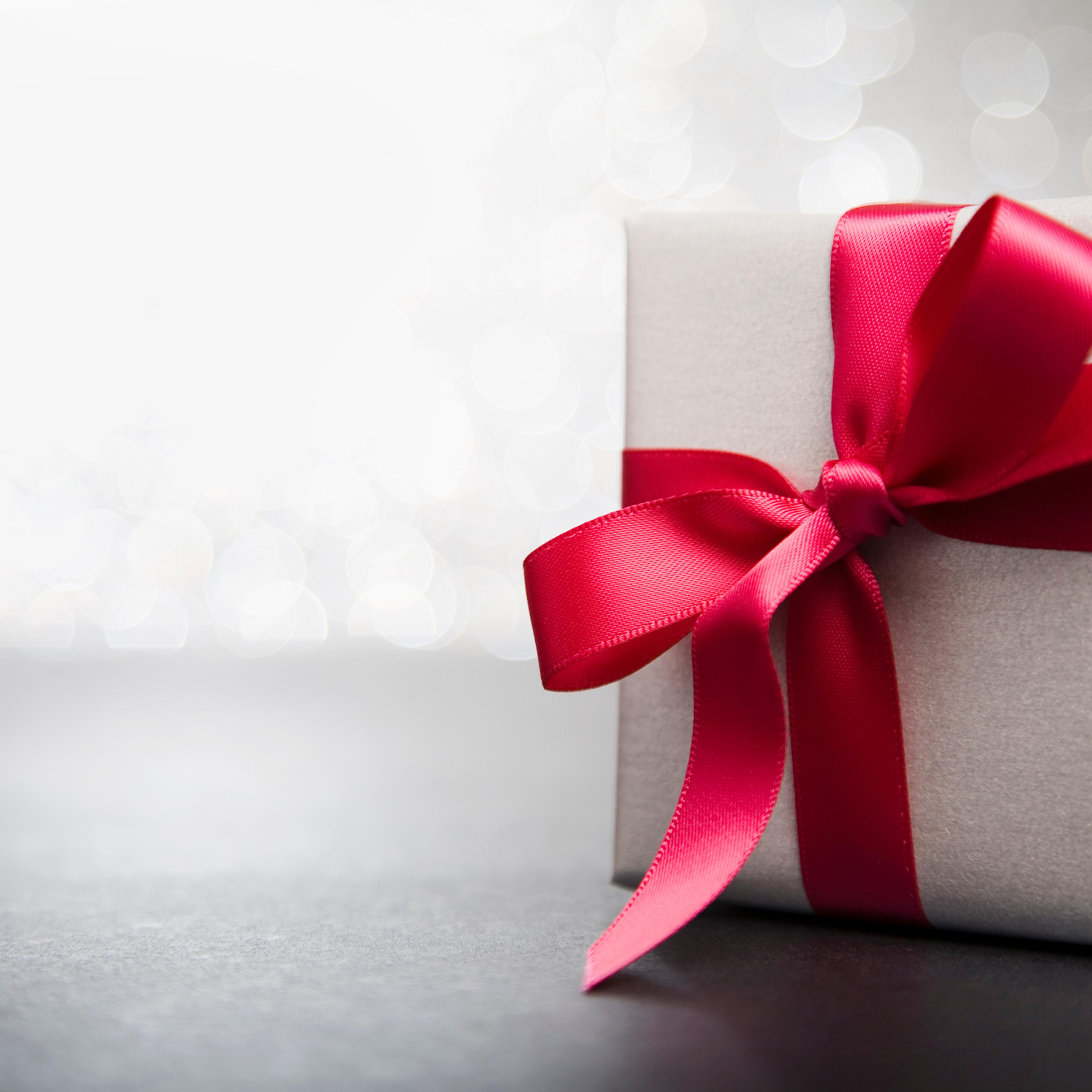 Wrapped gift with red ribbon