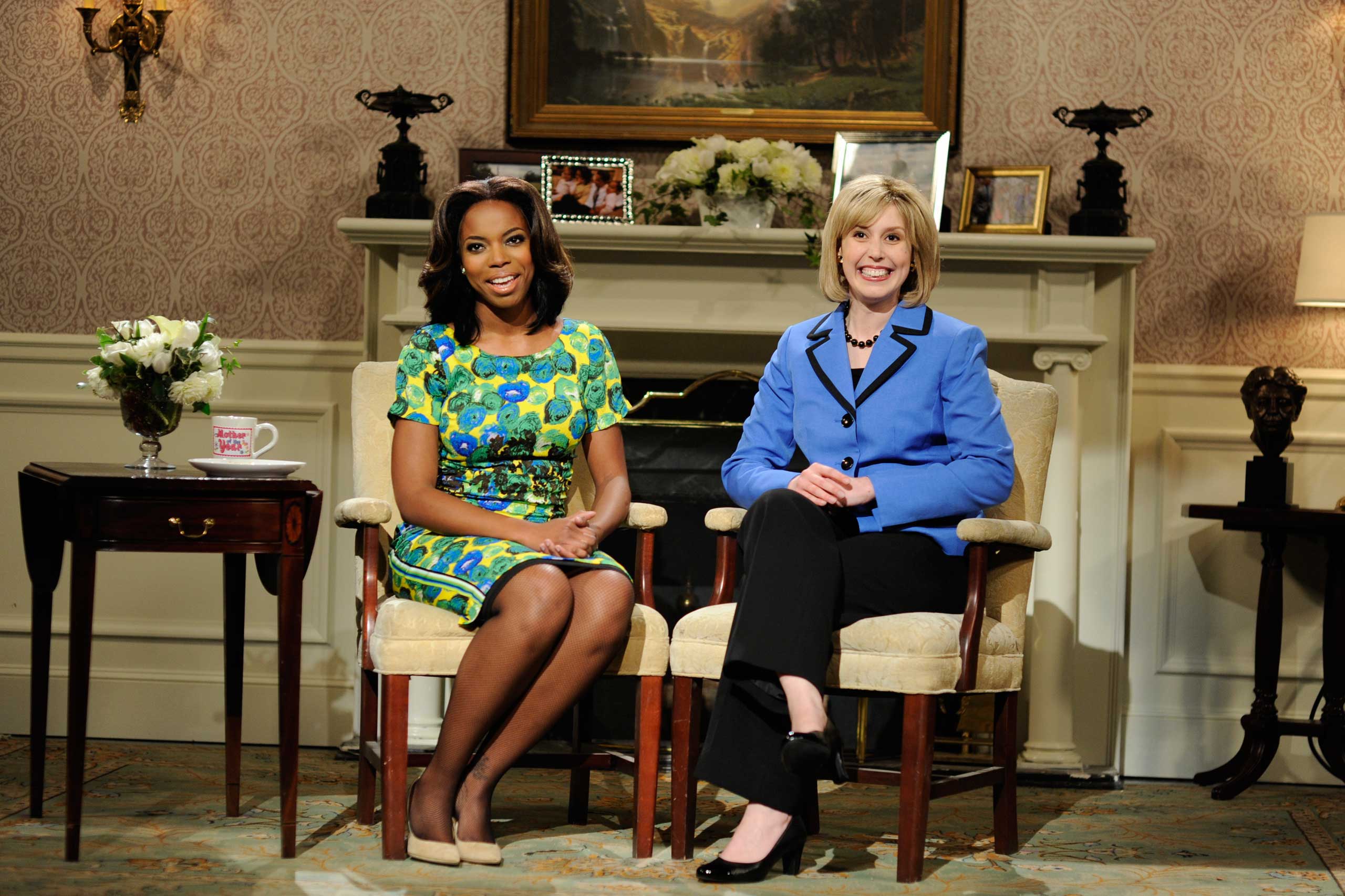 Pictured: (l-r) Sasheer Zamata as First Lady Michelle Obama and Vanessa Bayer as Secretary of State Hillary Clinton on May 10, 2014 .