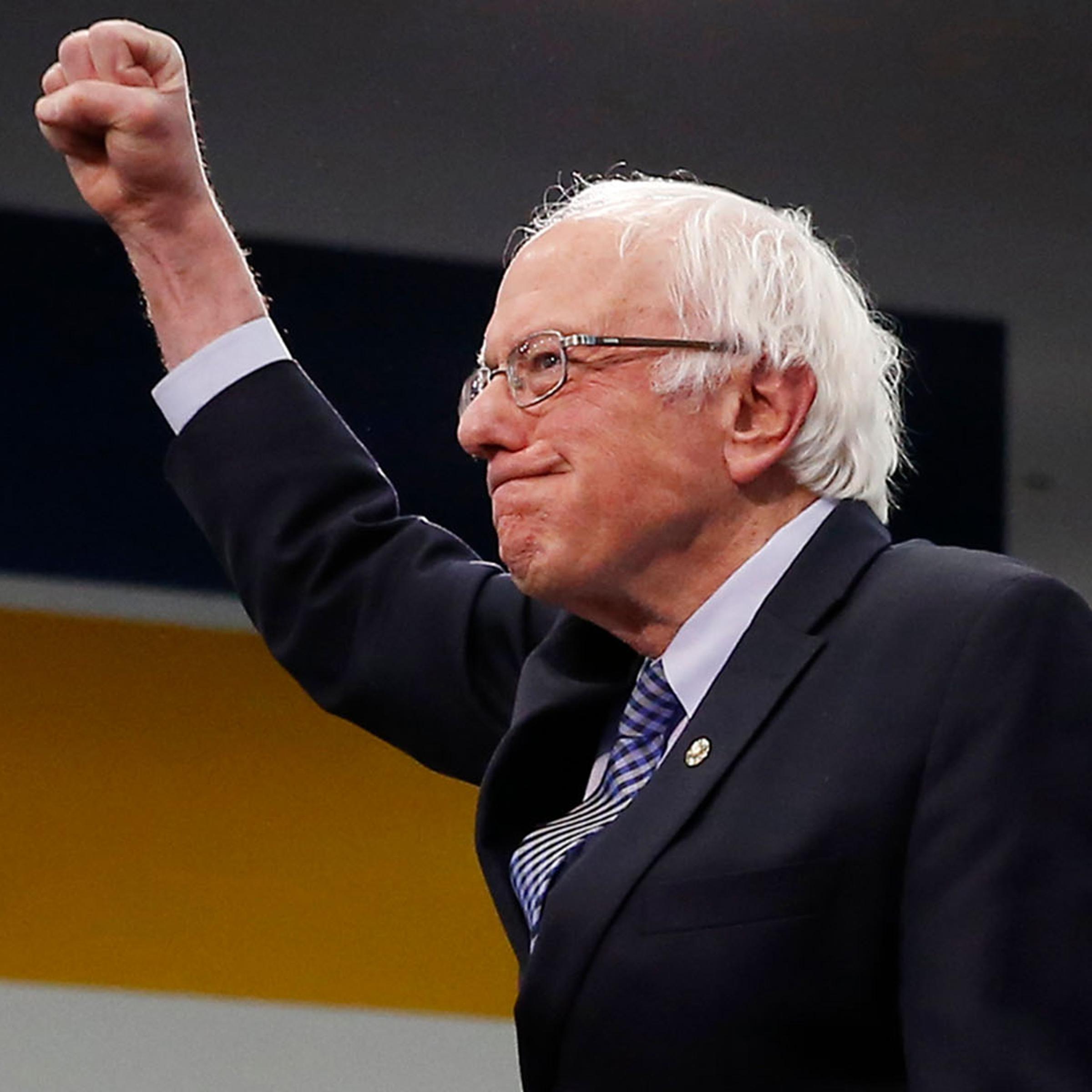 Senator Bernie Sanders pumps his fist as he takes the stage at his Primary Night Rally in Manchester, NH on Feb. 11, 2020. Bernie Sanders claimed victory in the first-of-the-nation primary in New Hampshire.