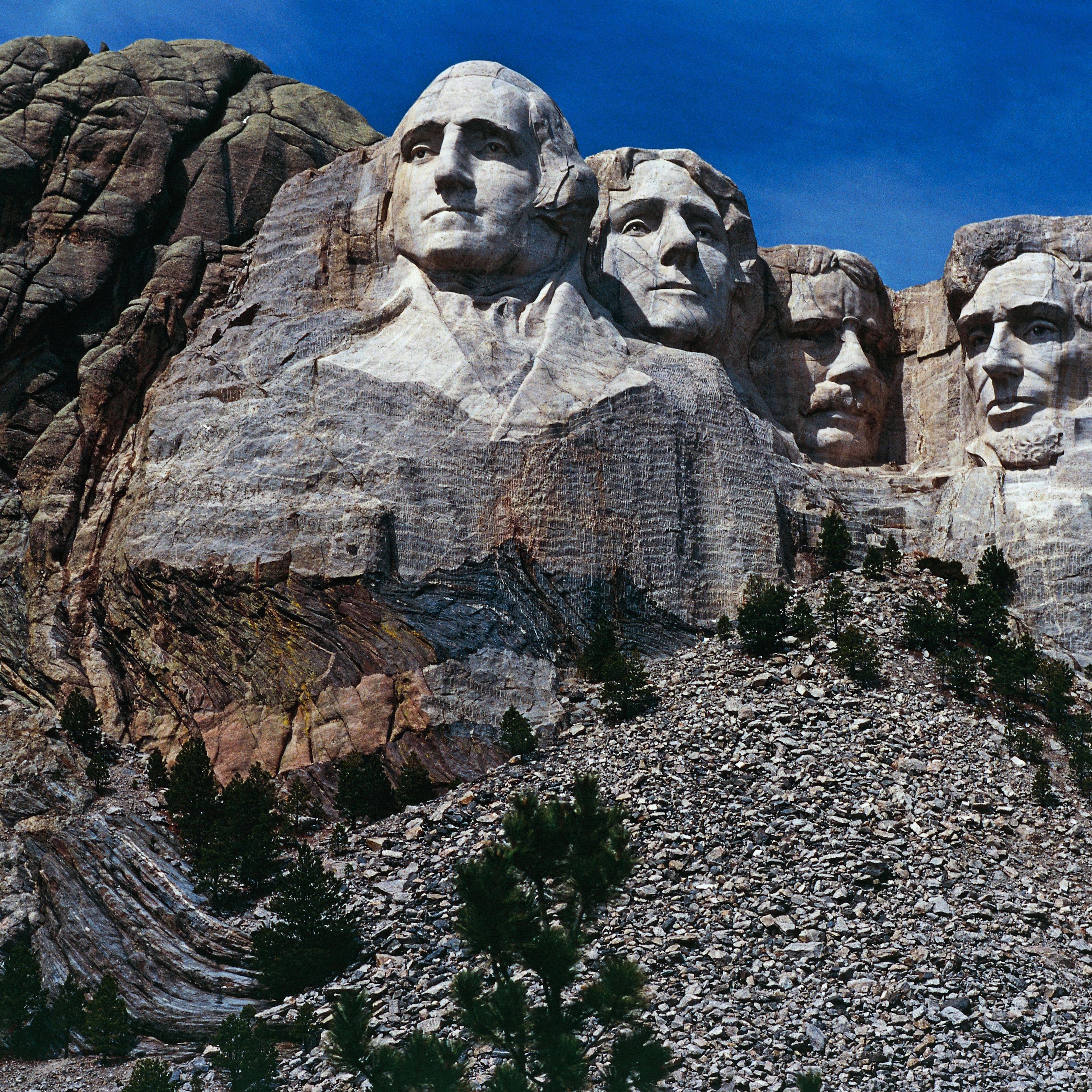 The carved sculptures depicting the faces of US Presidents George Washington (1732-1799) and Thomas Jefferson (1743-1826), National monument, Mount Rushmore, South Dakota, United States of America.