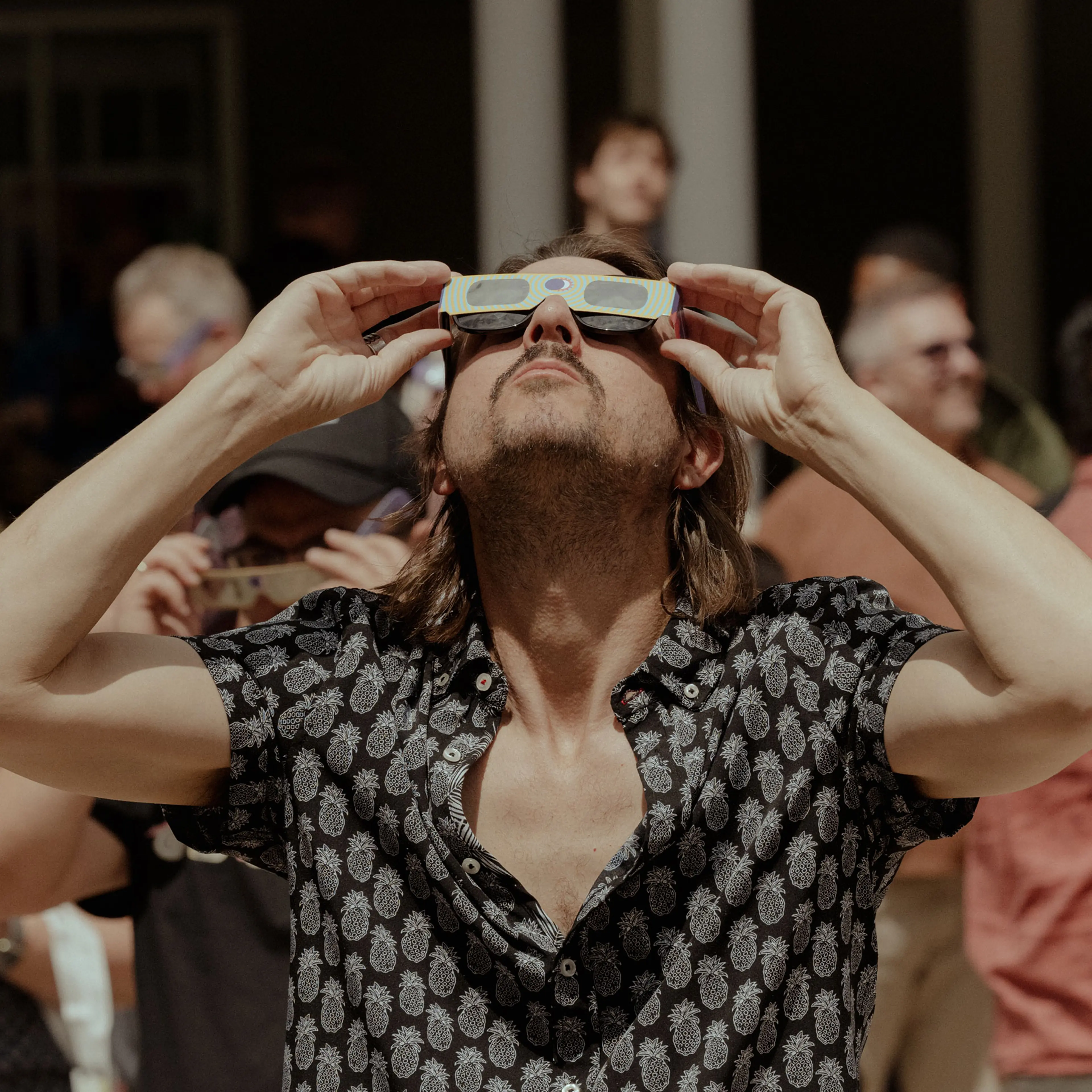 Solar eclipse viewing at Main Street Garden Park in Dallas, Texas.