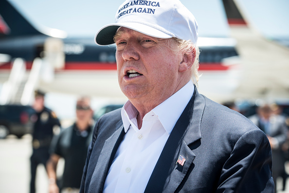 Republican Presidential candidate and business mogul Donald Trump exits his plane during his trip to the border on July 23, 2015 in Laredo, Texas.