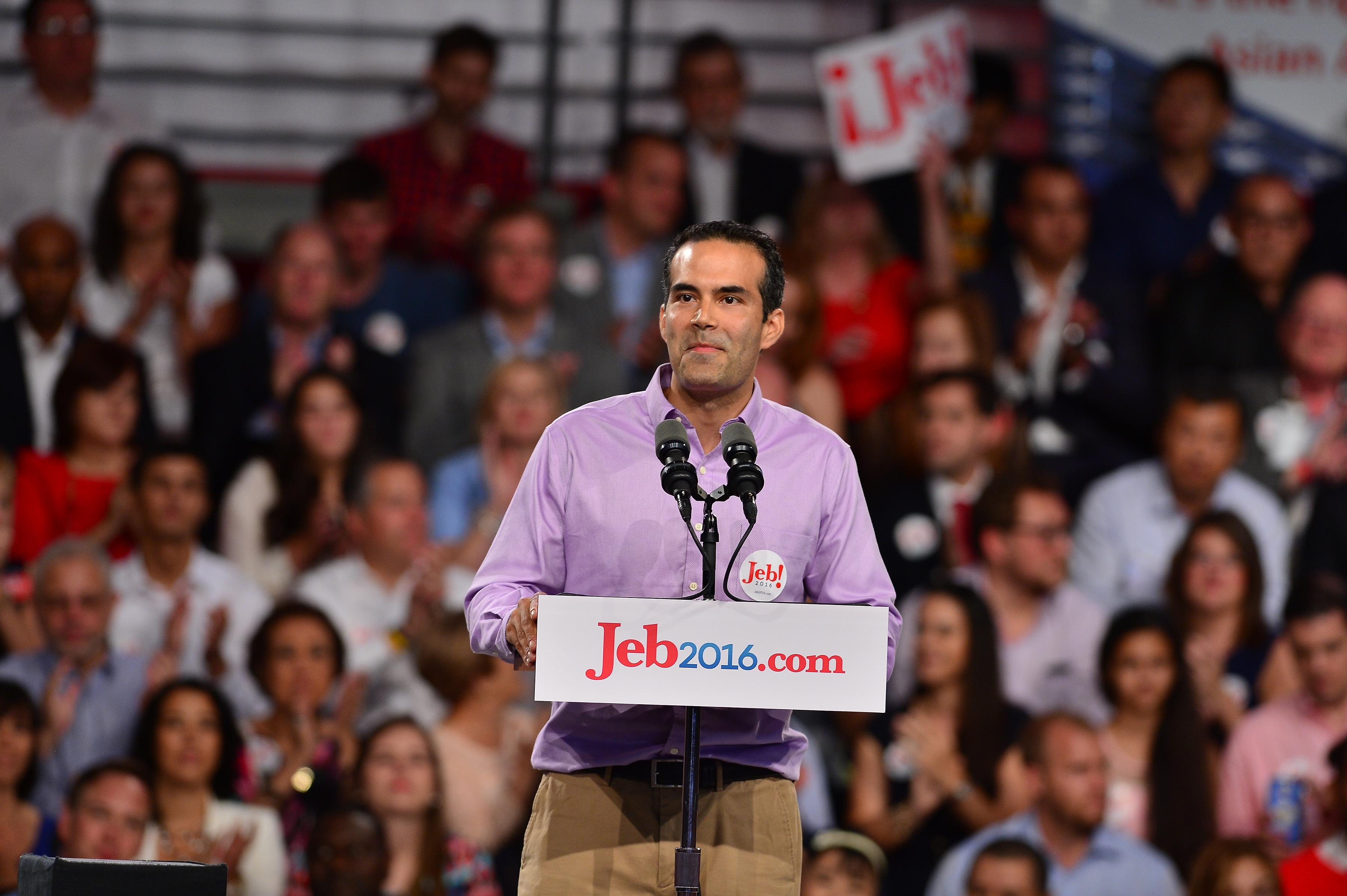 George P. Bush introduces his father, former Florida Governor Jeb Bush, as he announces his plan to seek the 2016 Republican presidential nomination at Miami Dade College Kendall Campus Theodore Gibson Health Center (Gymnasium) in Miami on June 15, 2015.
