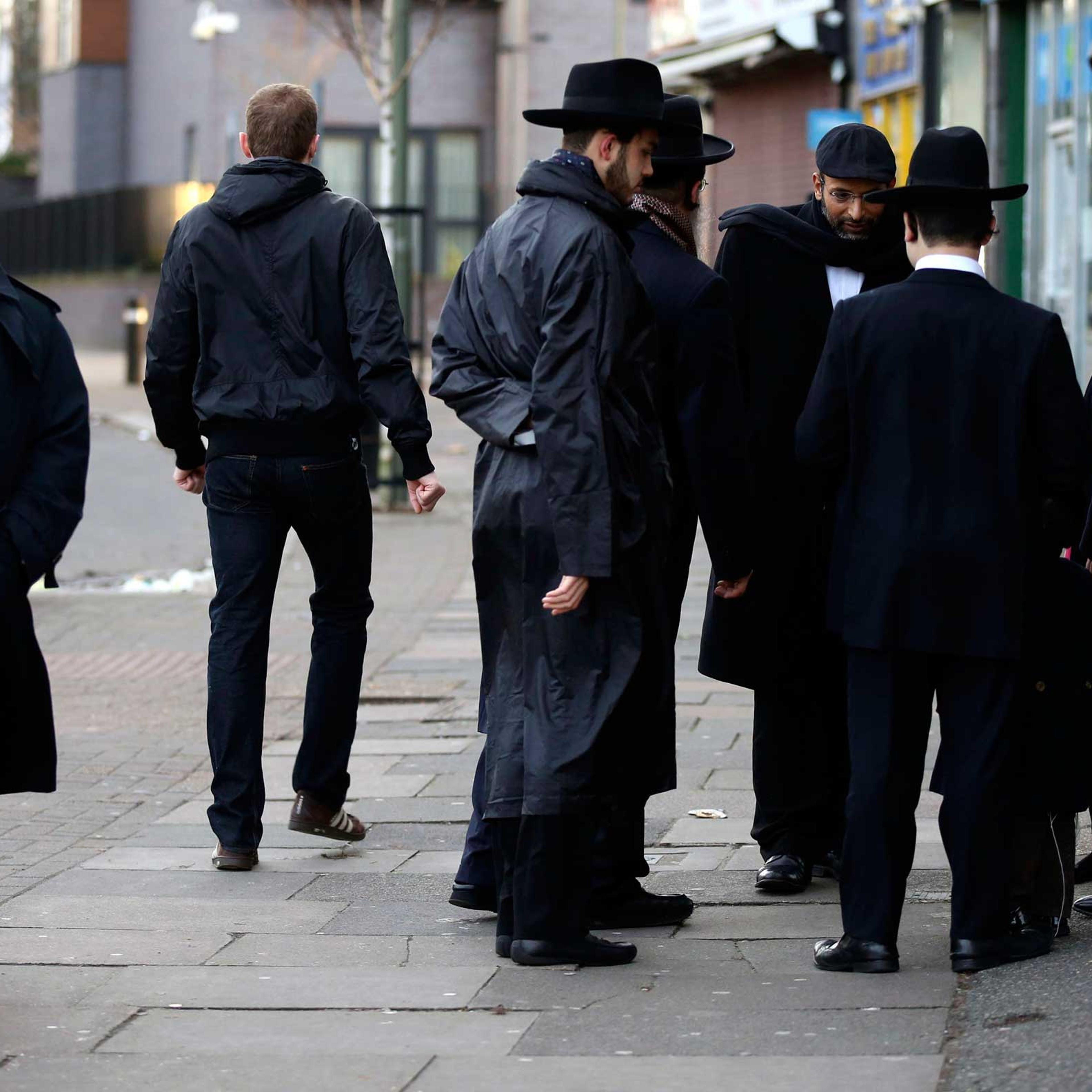 Jewish men talk in Golders Green, London, Jan. 10, 2015.