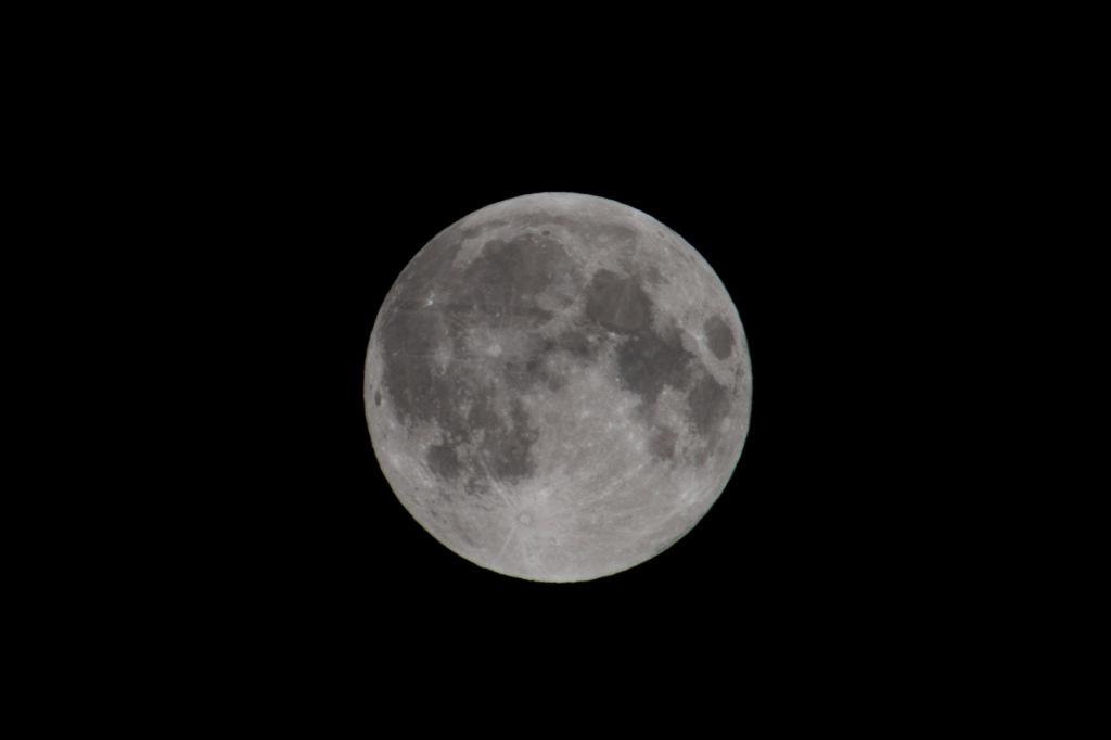 The moon seen on July 28, 2018 in Tulamben, Bali, Indonesia. July's full moon is known as the Full Buck Moon because it is the month when bucks typically begin to grow their new antlers.