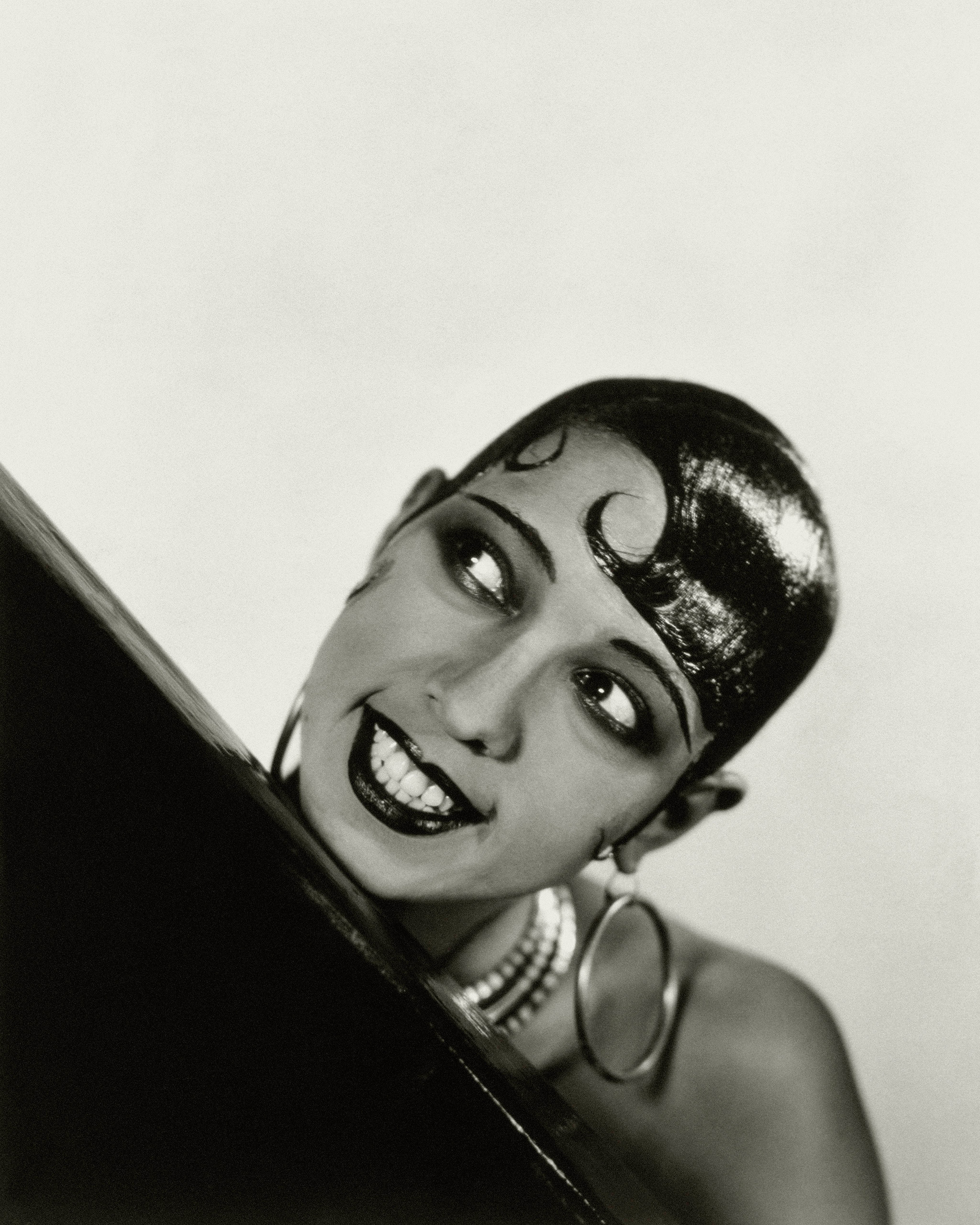 Josephine Baker, circa 1927, wearing large hoop earrings.