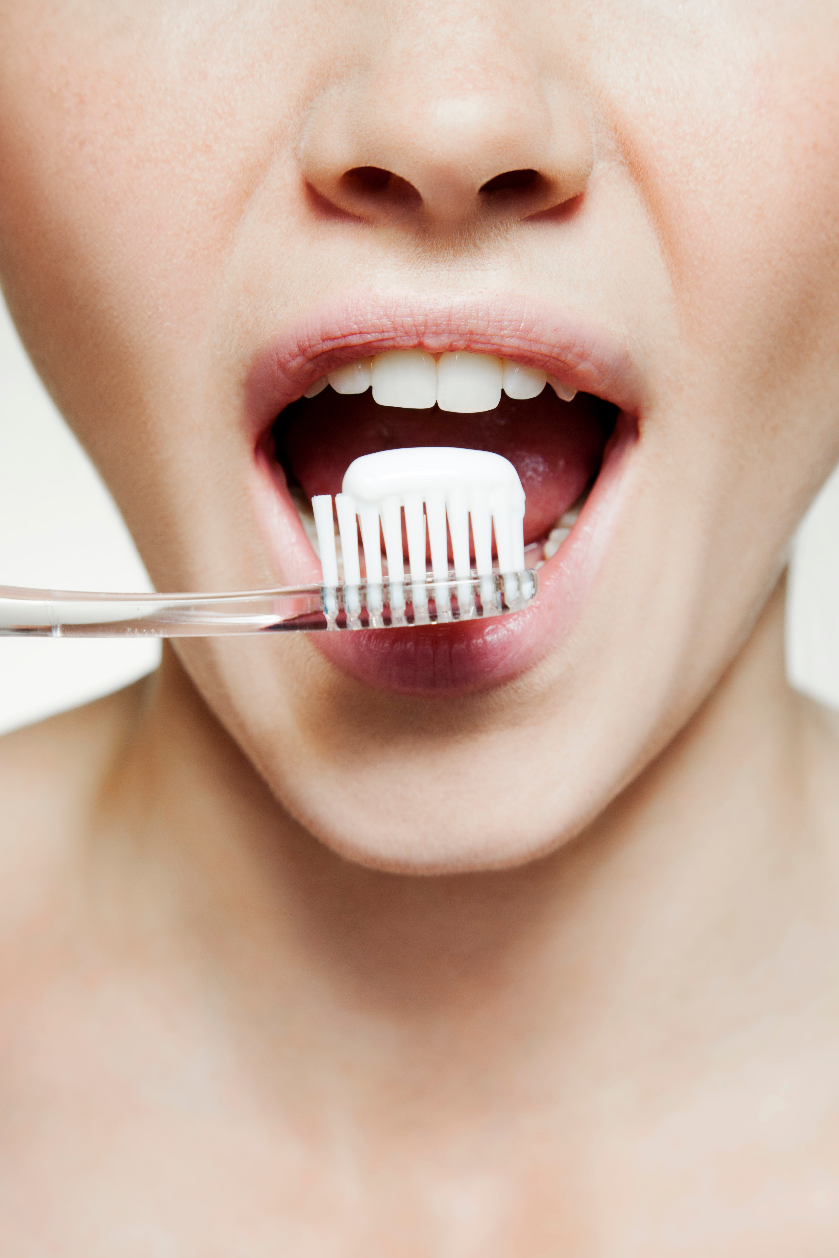 woman-mouth-teeth-toothbrush