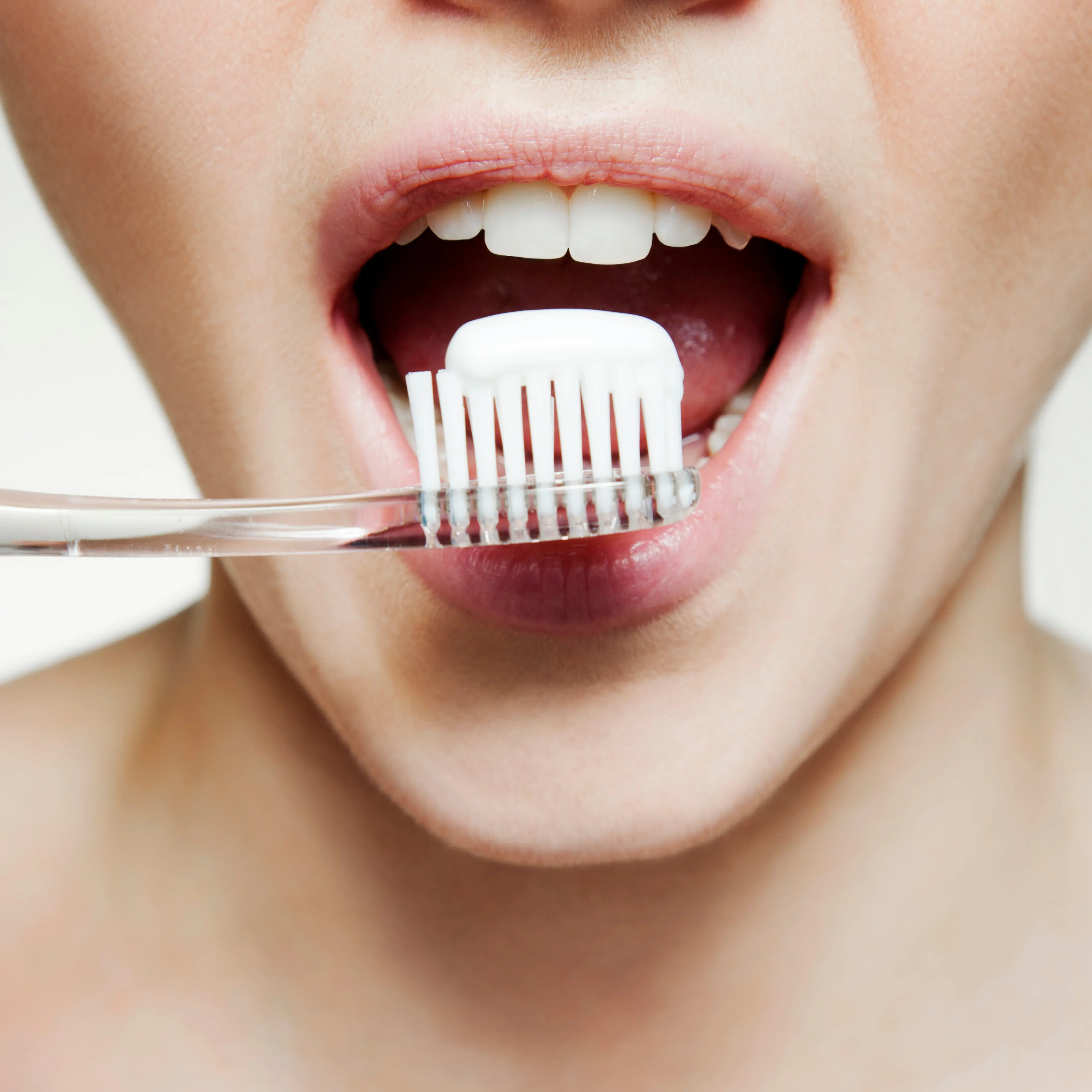 woman-mouth-teeth-toothbrush
