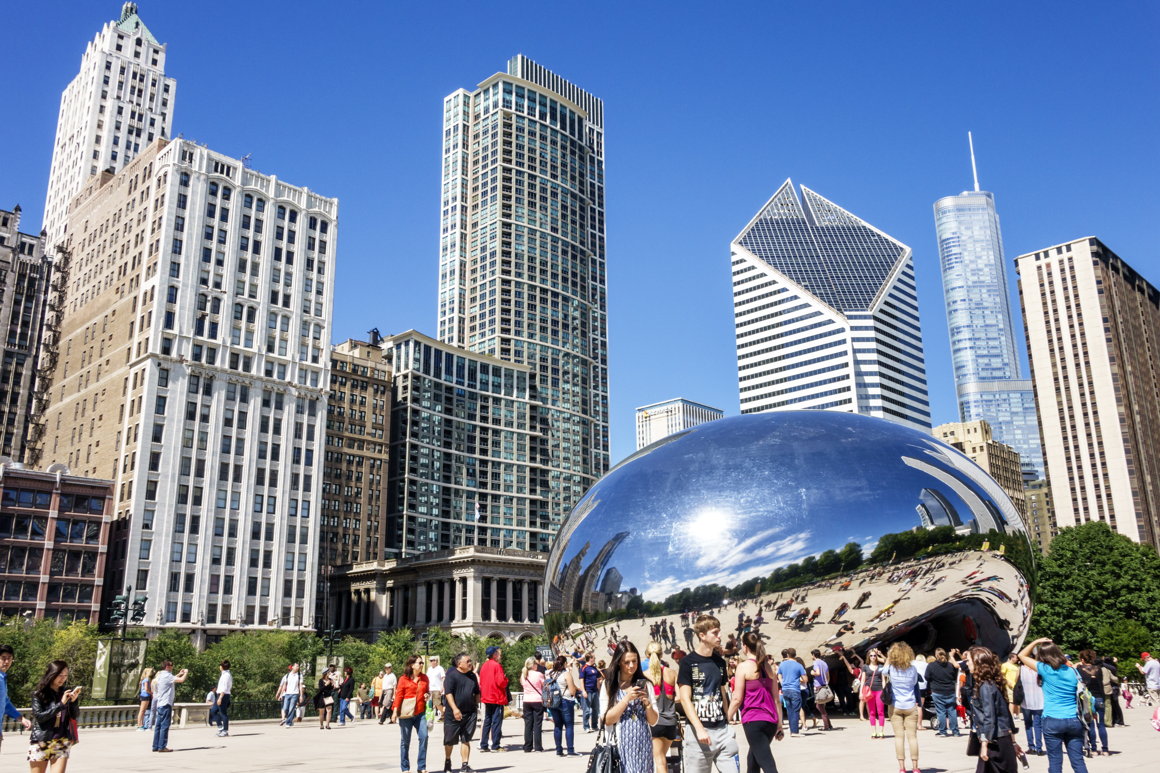 Millennium Park, Cloud Gate The Bean, public art with reflection of the distorted city skyline.