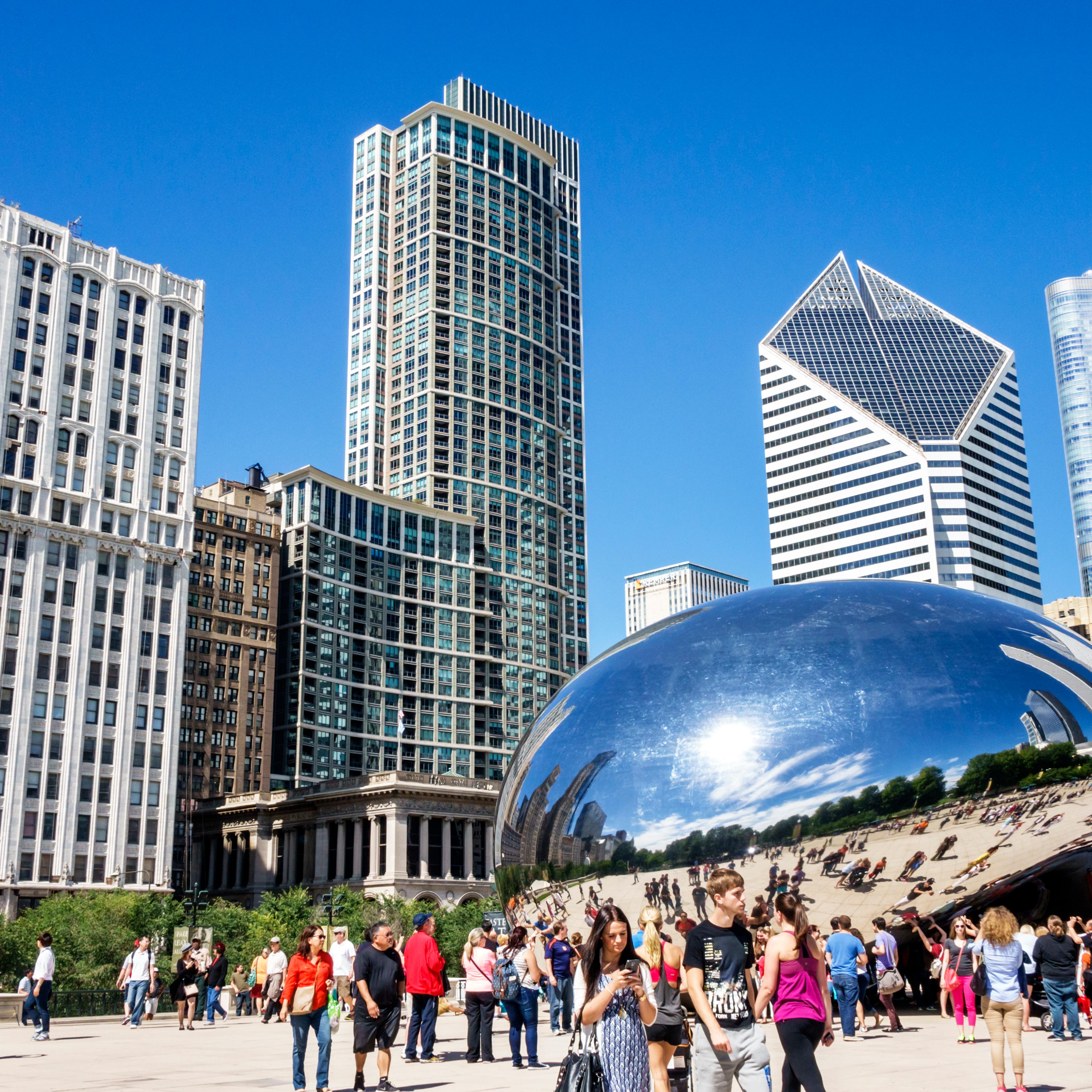 Millennium Park, Cloud Gate The Bean, public art with reflection of the distorted city skyline.