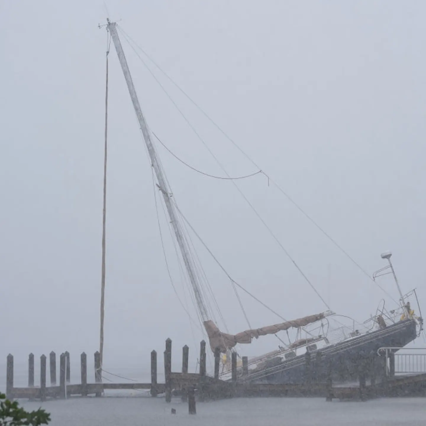 A boat struggles to stand still as Hurricane Milton bears down on the Gulf Coast in Sarasota, Fla. on Oct. 9, 2024.