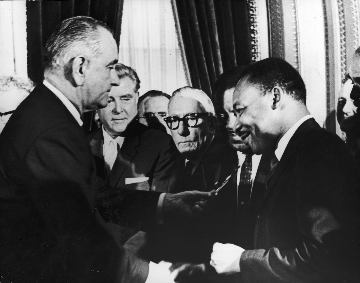 LBJ hands pen to MLK
