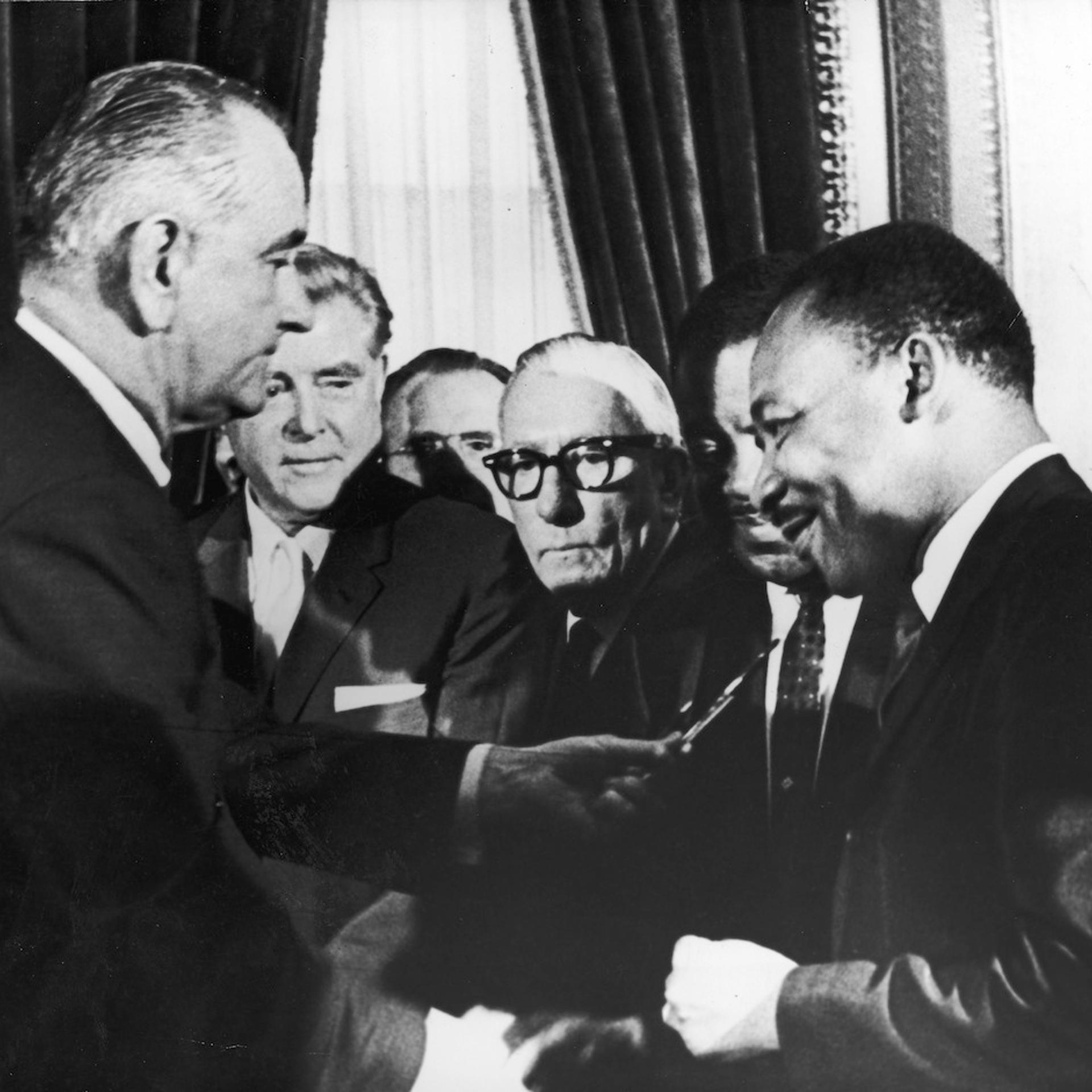 LBJ hands pen to MLK