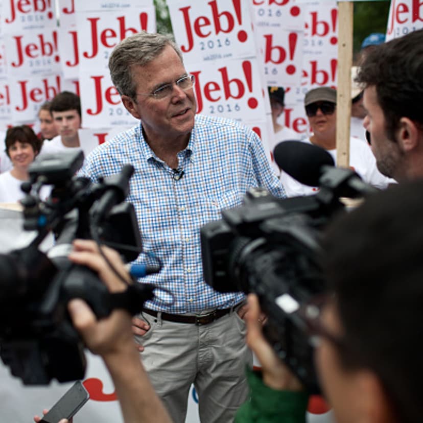 Republican Presidential candidate Jeb Bush speaks to the press at the 4th of July Parade in Merrimack, New Hampshire.