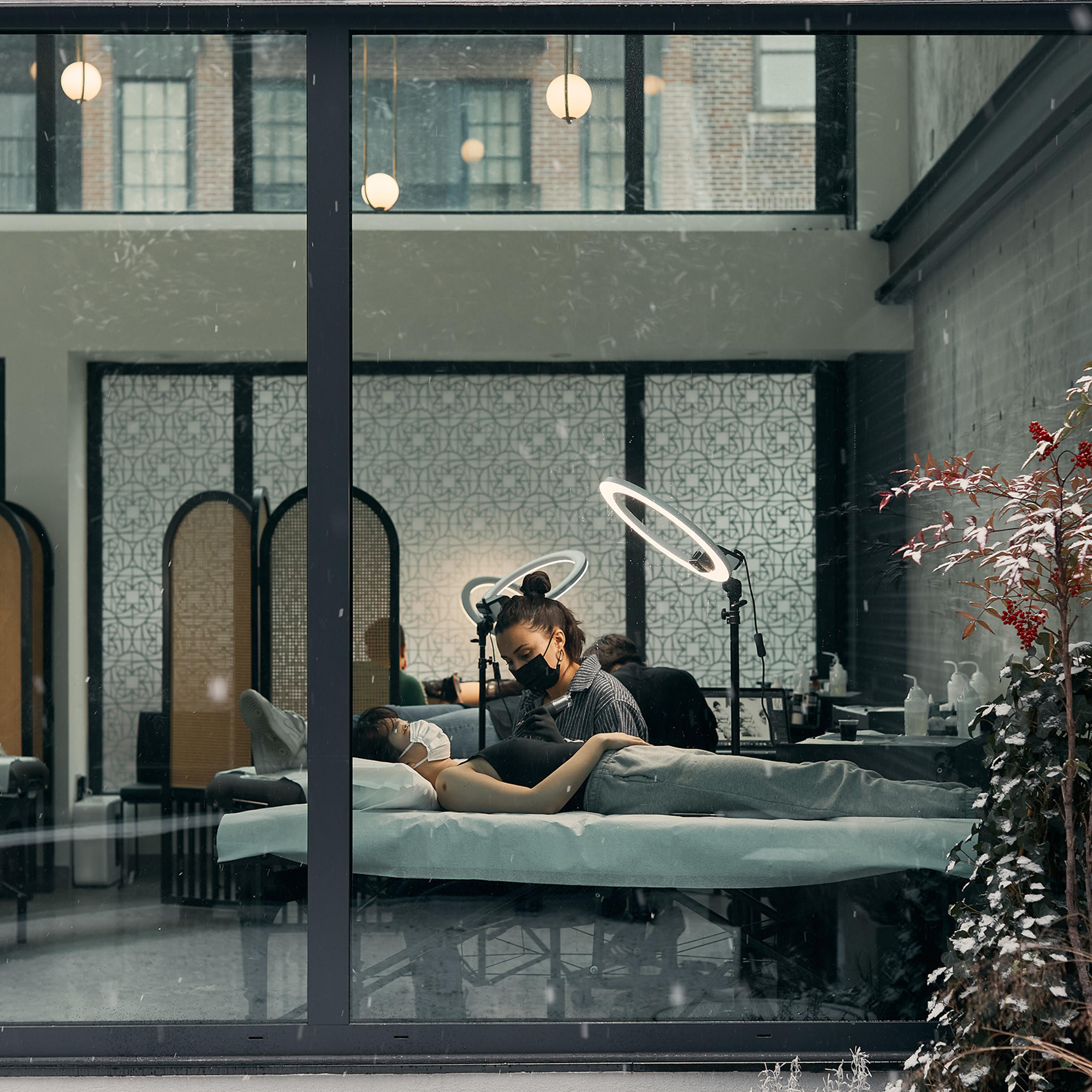 Atelier Eva, a tattoo studio in Brooklyn. Co-founders Peter Jenkins and Eva Karabudak say clients have been leaning into the zen aspects of the tattoo process during the pandemic.