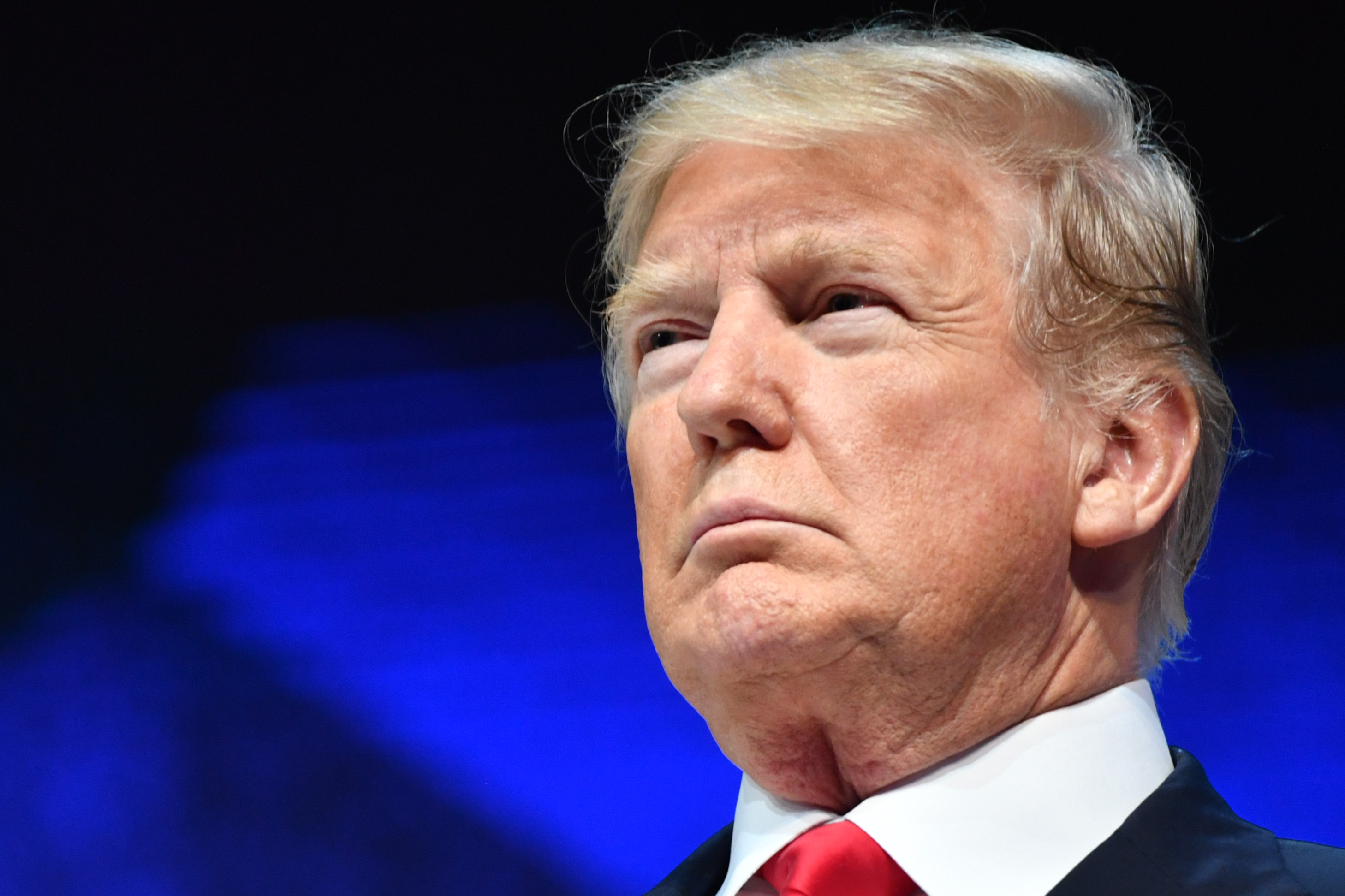 Donald Trump looks on at Davos