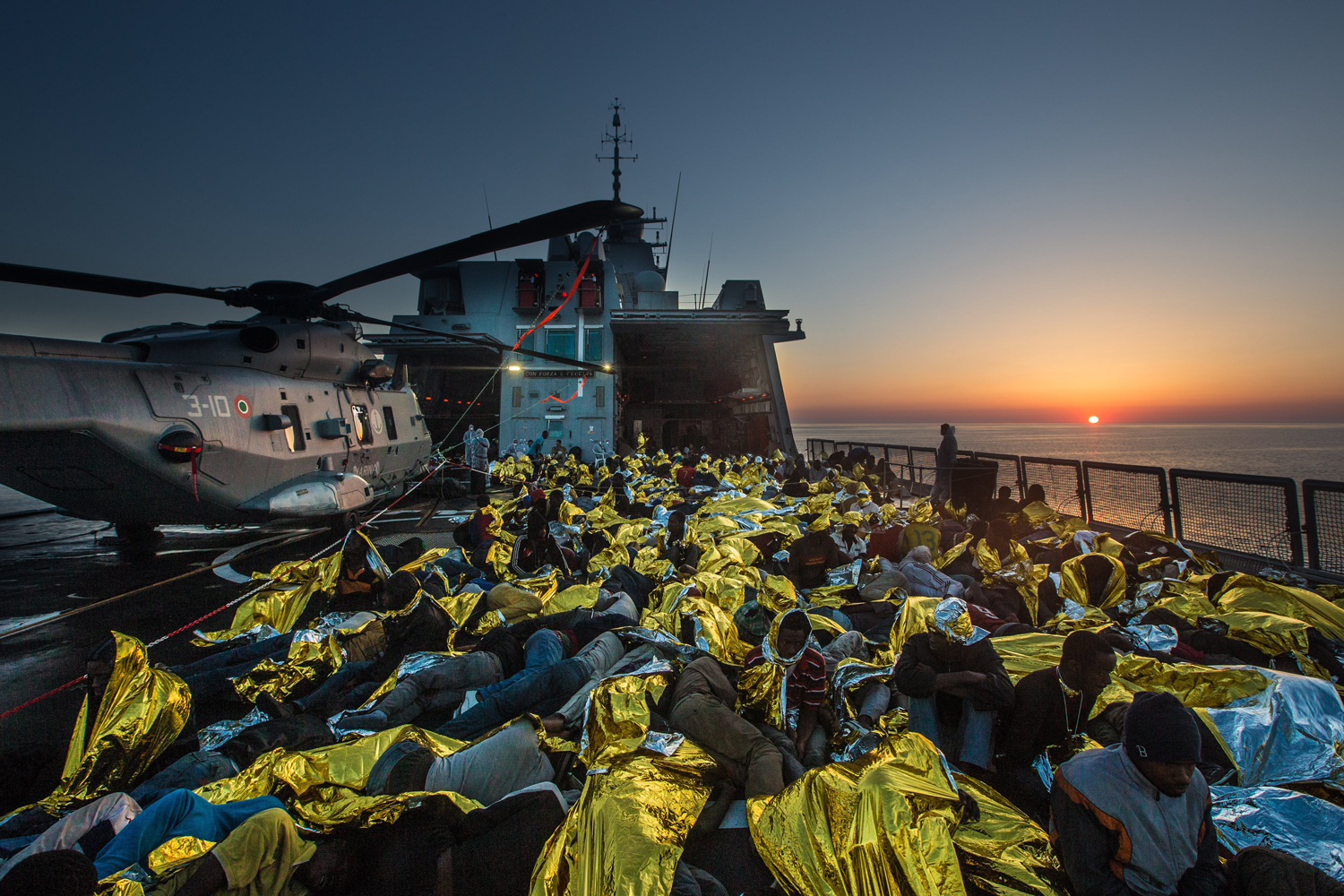 Italian navy rescue asylum seekers