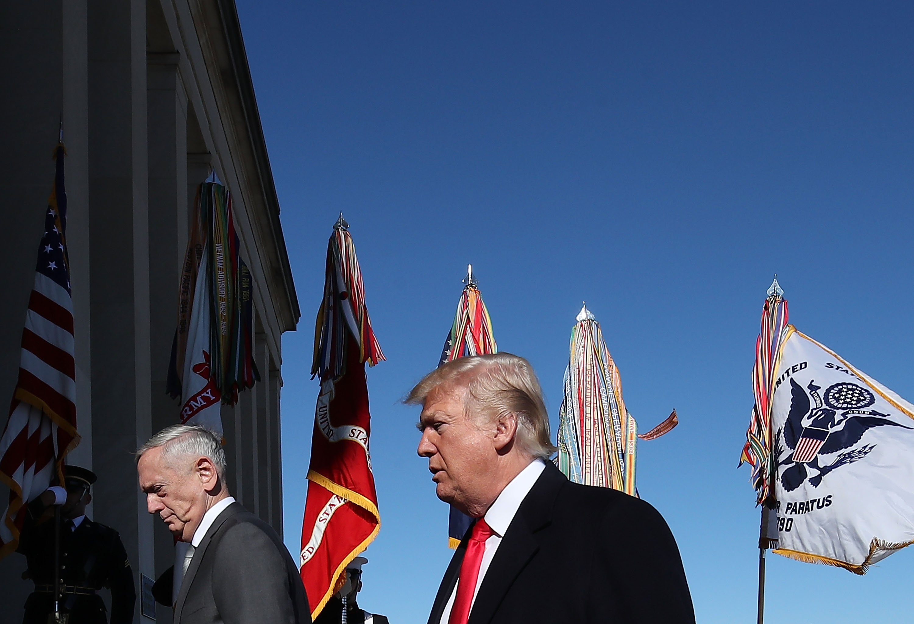U.S. President Donald Trump and Defense Secretary Jim Mattis (L) walk into the Pentagon for a meeting with military leaders on January 18, 2018 in Arlington, Virginia.