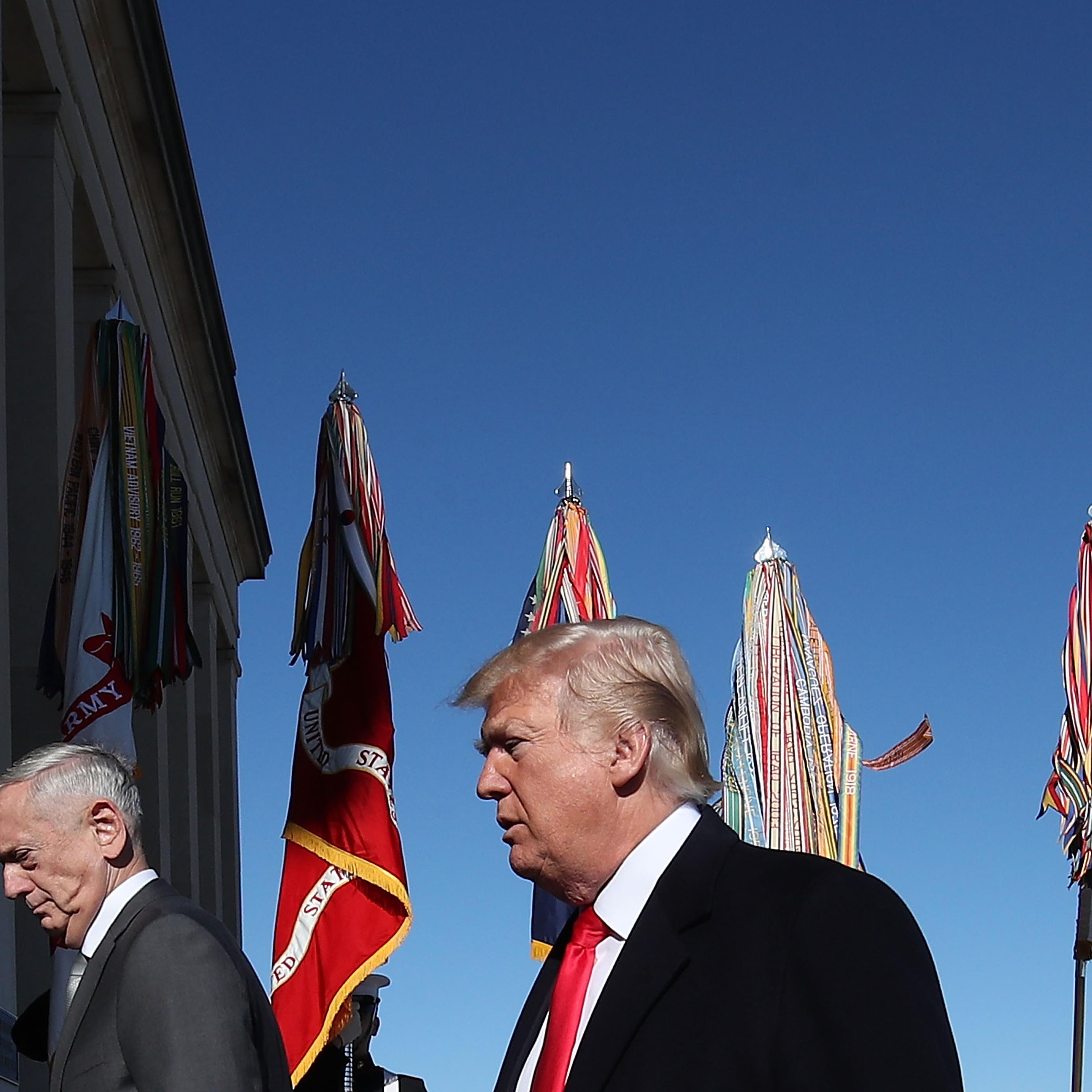 U.S. President Donald Trump and Defense Secretary Jim Mattis (L) walk into the Pentagon for a meeting with military leaders on January 18, 2018 in Arlington, Virginia.