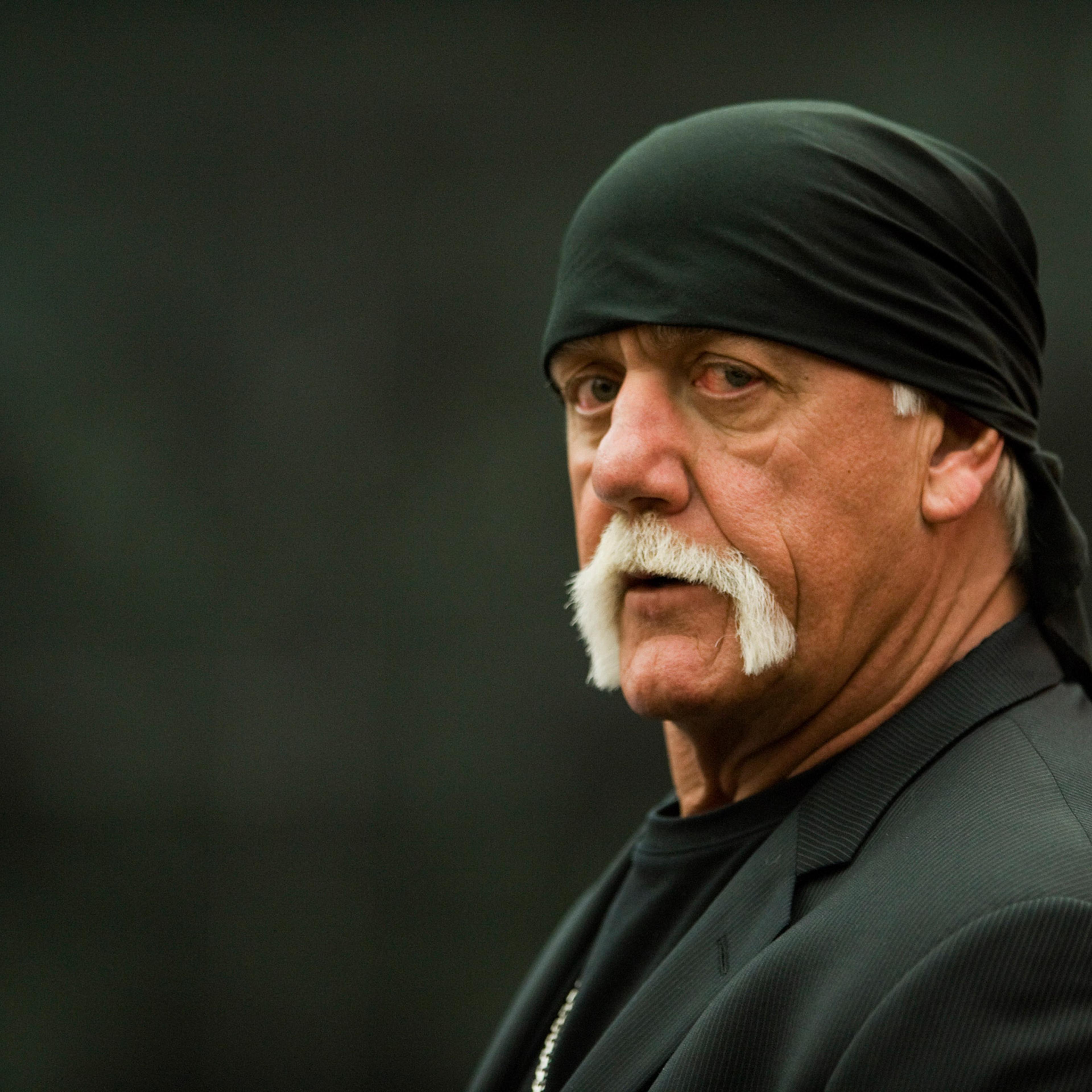 Former professional wrestler Hulk Hogan arrives in the courtroom Wednesday, March 16, 2016, in St. Petersburg, Fla. Hogan, whose given name is Terry Bollea, and his attorneys are suing Gawker Media for $100 million, saying his privacy was violated, and h