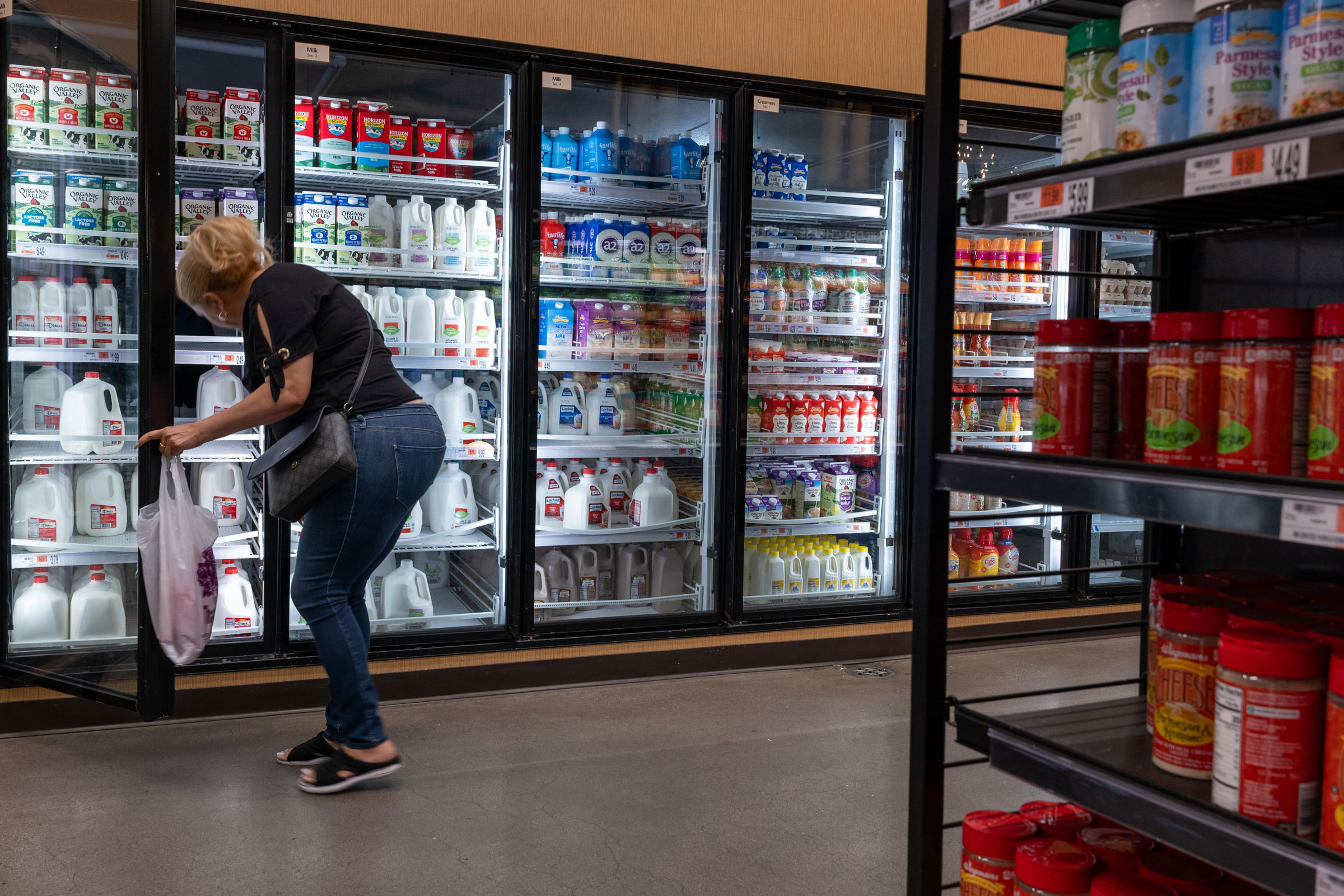 People shop at a grocery store in Brooklyn on July 11, 2024.