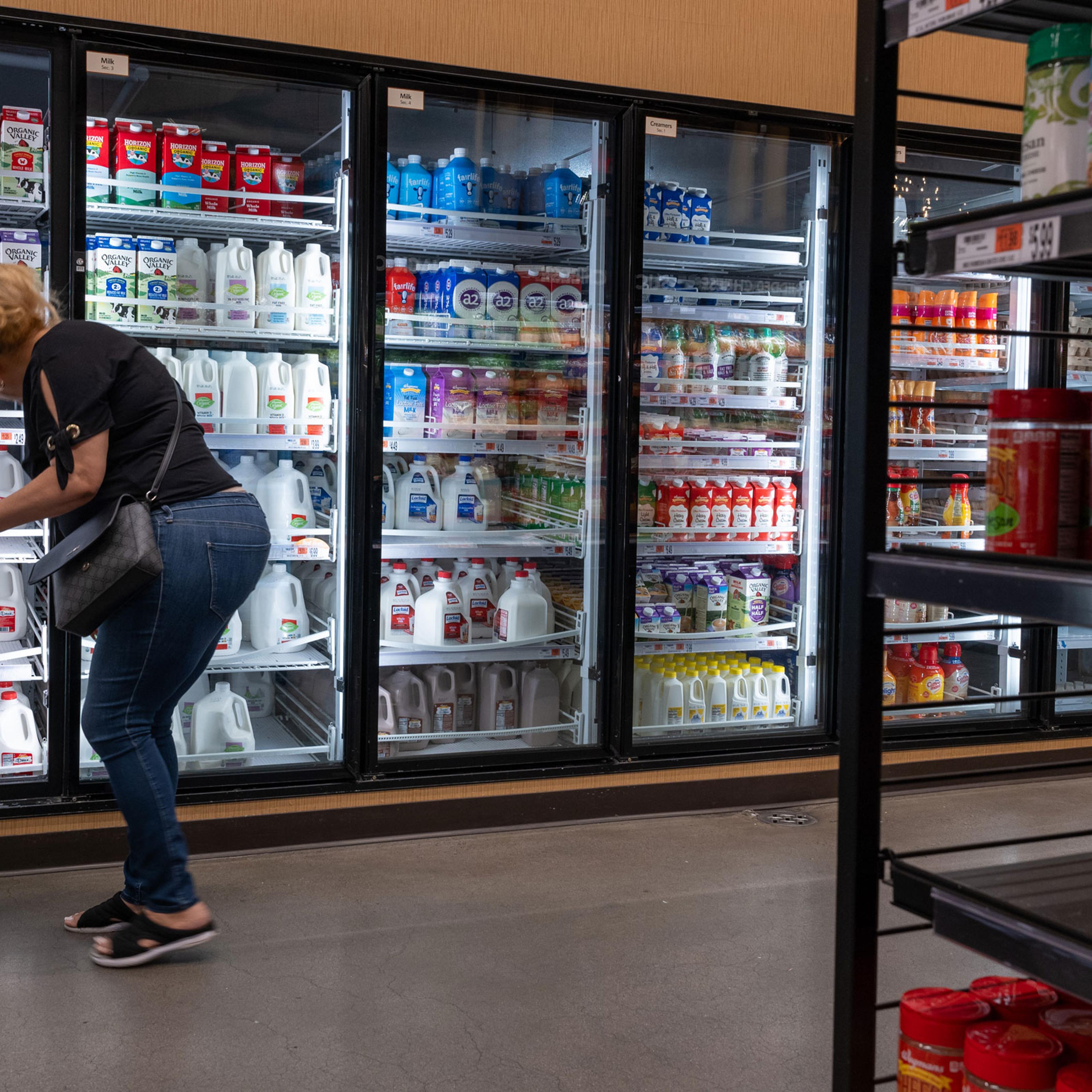People shop at a grocery store in Brooklyn on July 11, 2024.