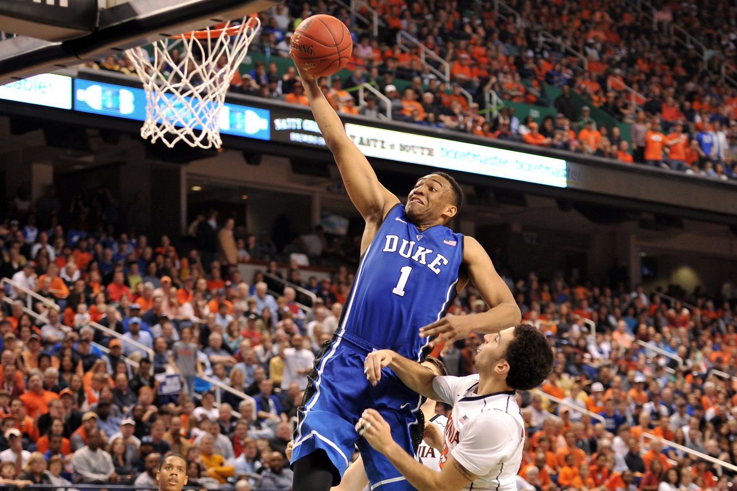 Jabari Parker, #1 of the Duke Blue Devils, goes up for a dunk against the Virginia Cavaliers during the finals of the 2014 Men's ACC Basketball Tournament on March 16, 2014 in Greensboro, North Carolina. Virginia defeated Duke 72-63.