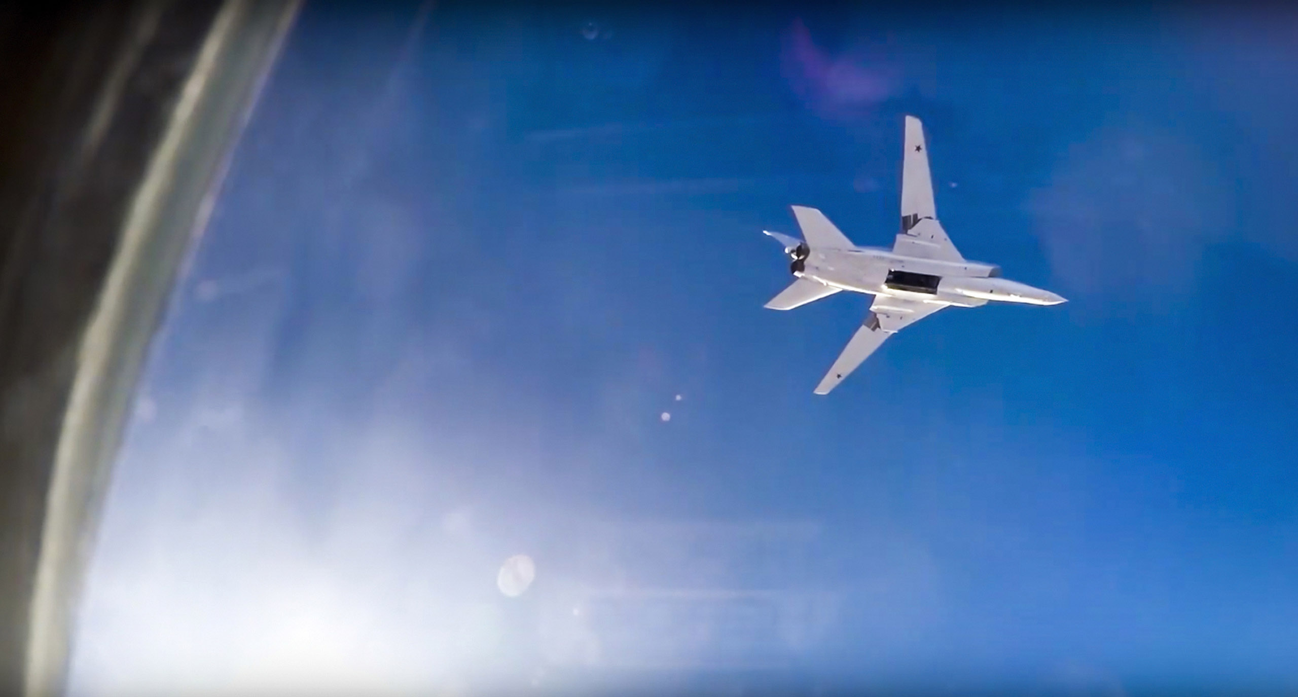 Russian long range bomber Tu-22M3 flies during an air strike over Aleppo region of Syria on Aug. 16, 2016.