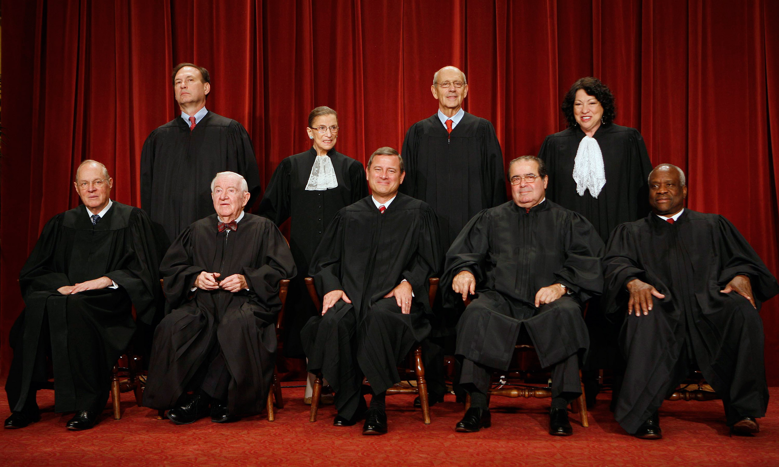 UNITED STATES - SEPTEMBER 29: The justices of the U.S. Supreme Court pose for their official photo in Washington, D.C., U.S., on Tuesday, Sept. 29, 2009. Seated from front left are Anthony Kennedy, John Paul Stevens, Chief Justice John G. Roberts, Antoni