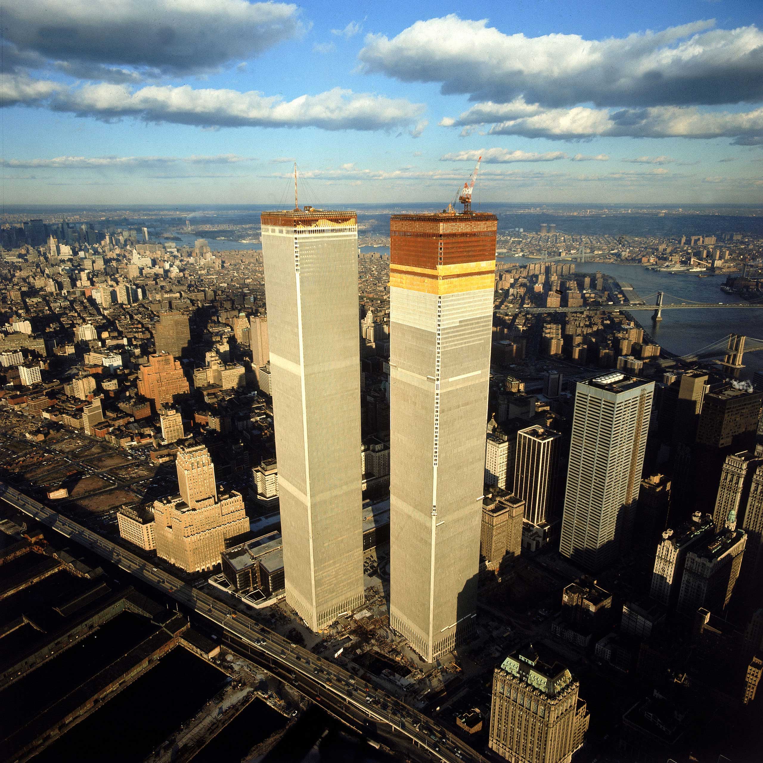 Aerial view from lower West Side with new World Trade Center's Twin Towers (fore) against background of Manhattan.