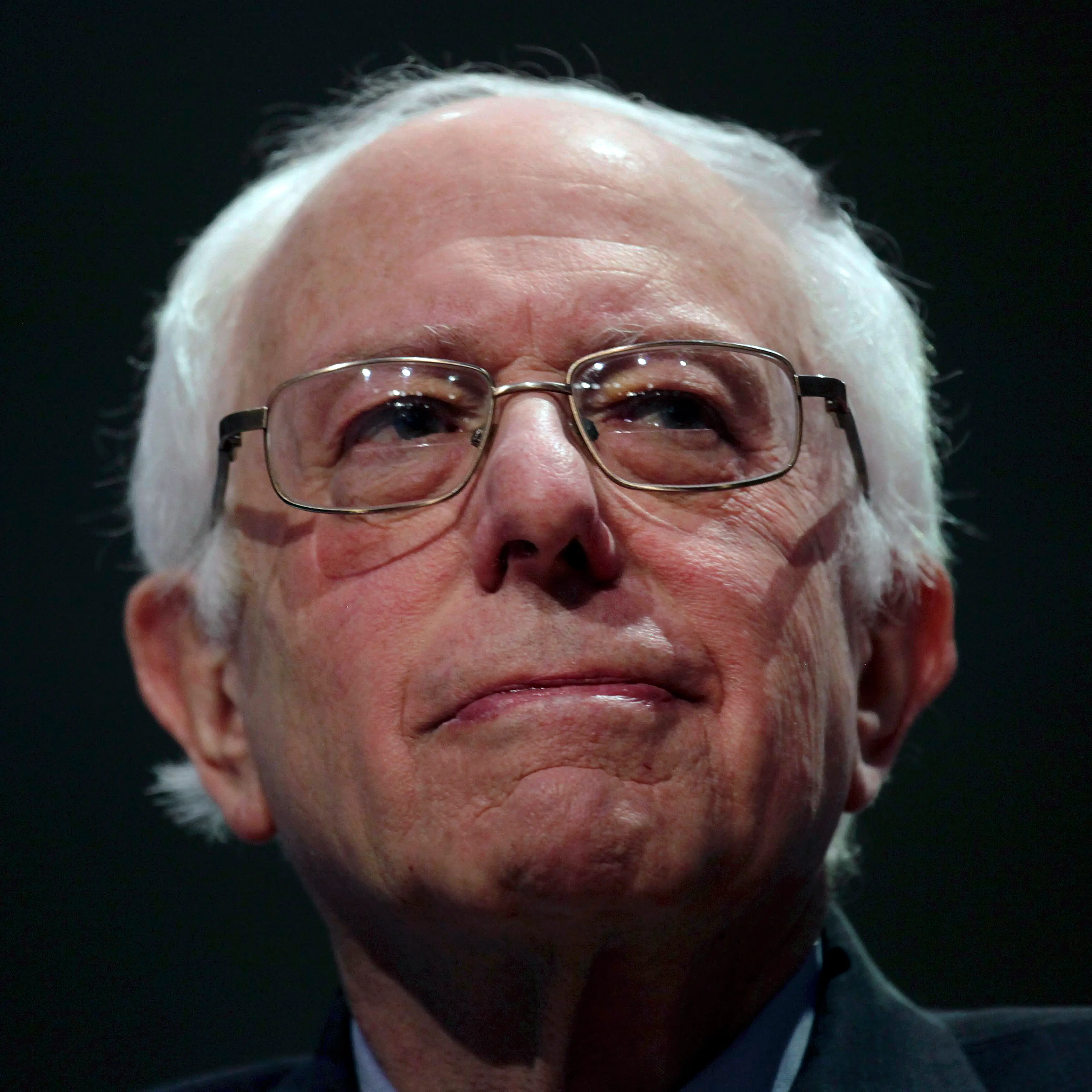 Democratic. presidential candidate, Vermont Senator Bernie Sanders appears with former Secretary of State Hillary Clinton at a debate in Milwaukee on Feb. 11, 2016.