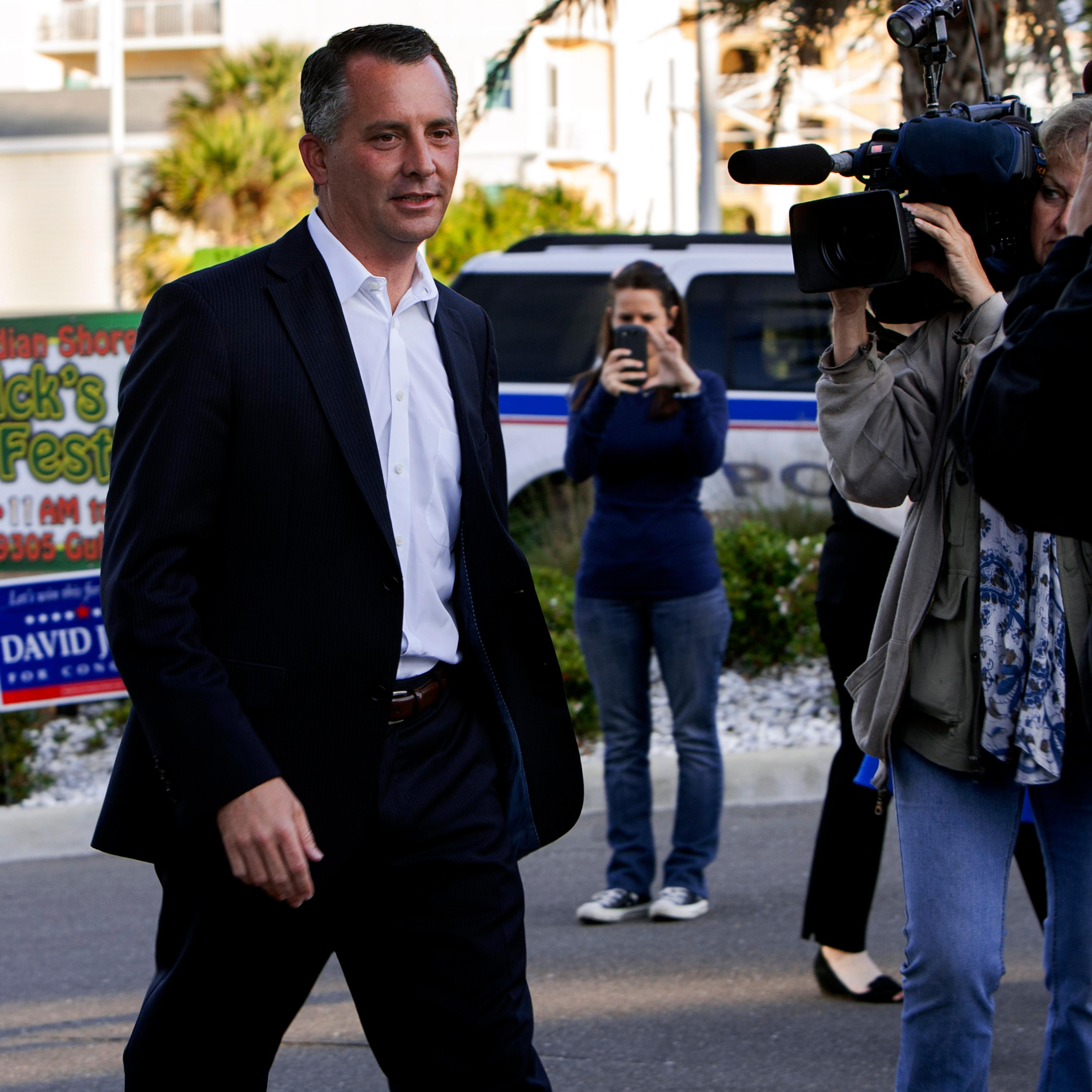 Candidate David Jolly arrives at the Indian Shores Town Hall to place his vote in the special election for Florida 13th Congressional District in Indian Shores, Fla., March 11, 2014.