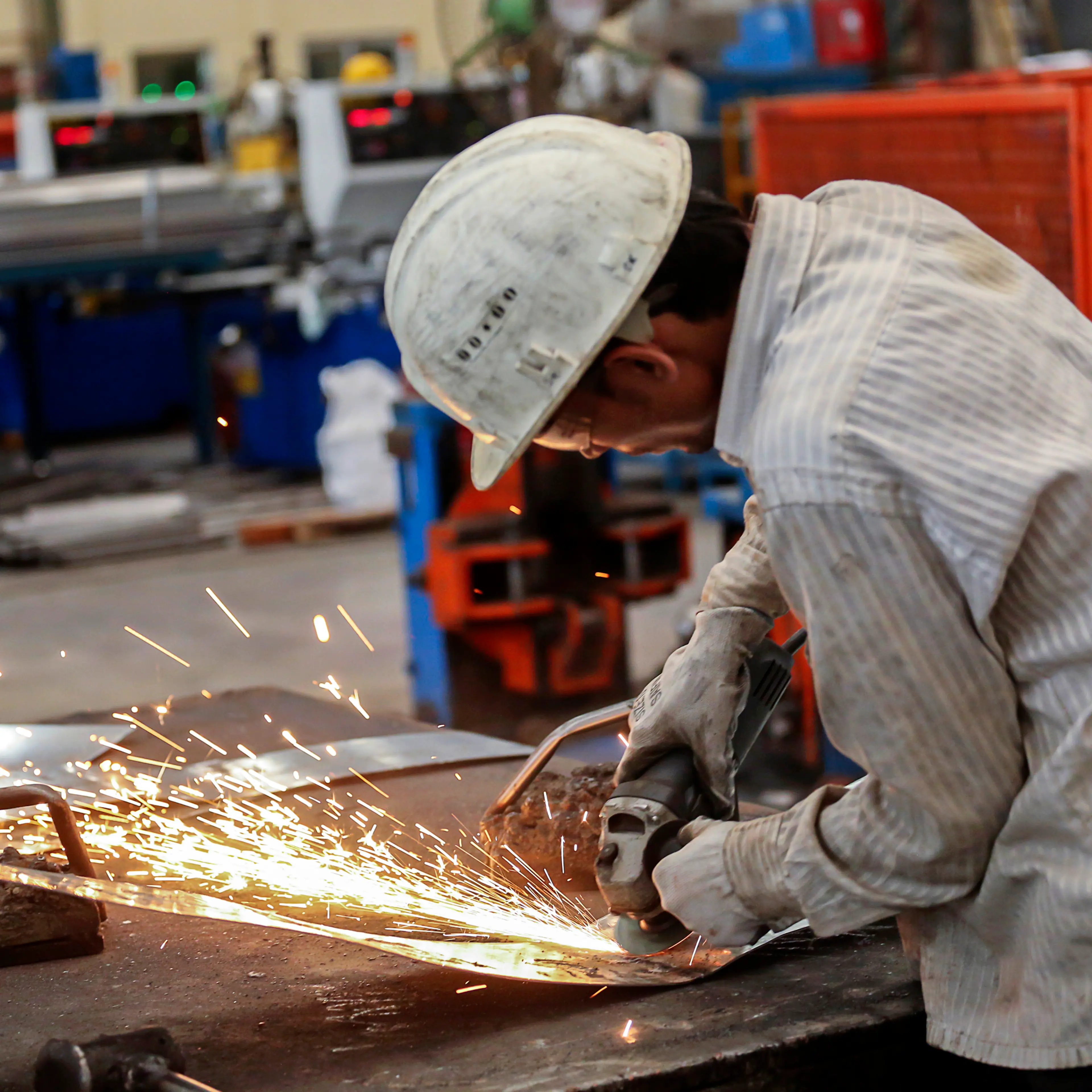A worker at a company processing steel in Khopoli, India, in 2014.