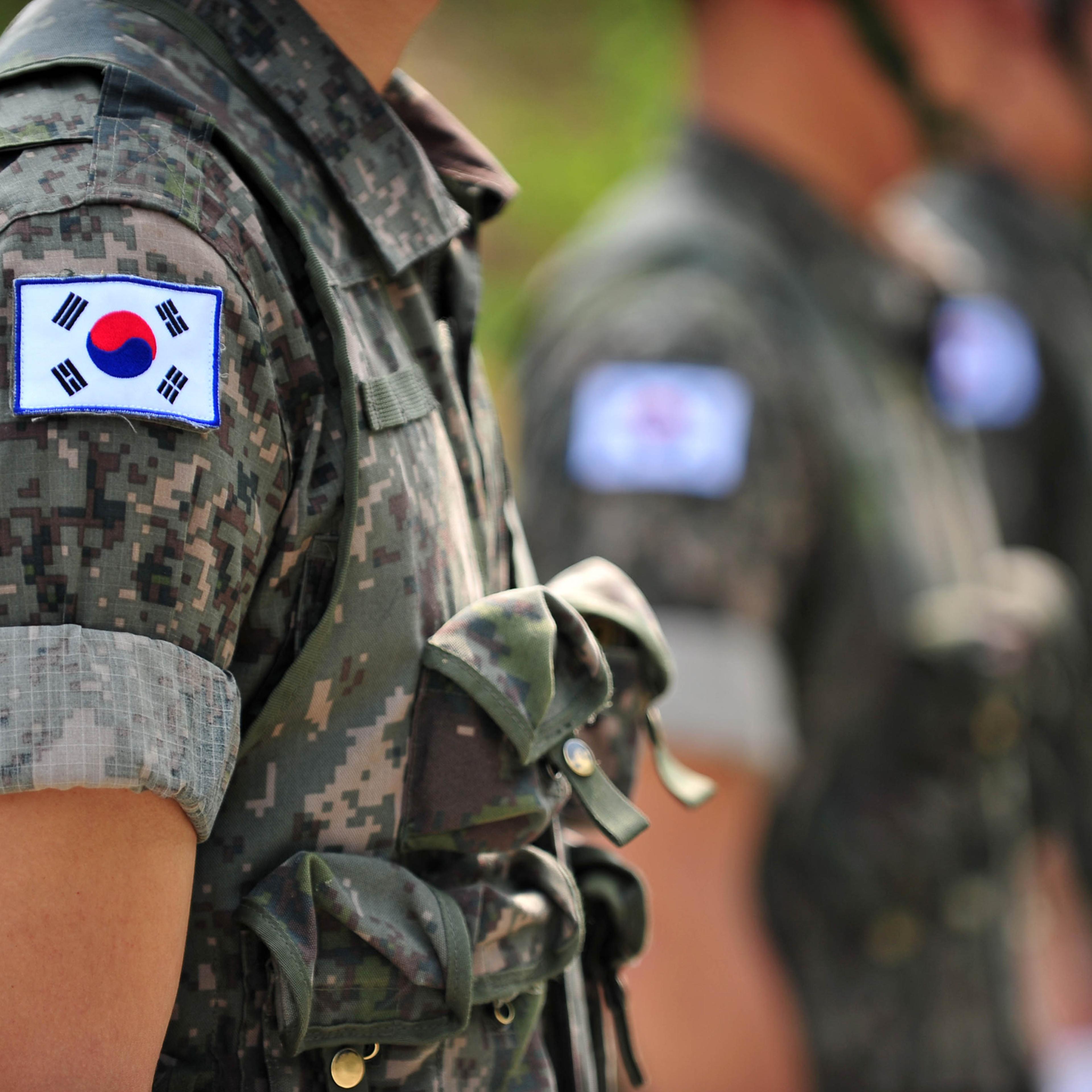 Republic of Korea army soldier and Korean flag Taegeukgi