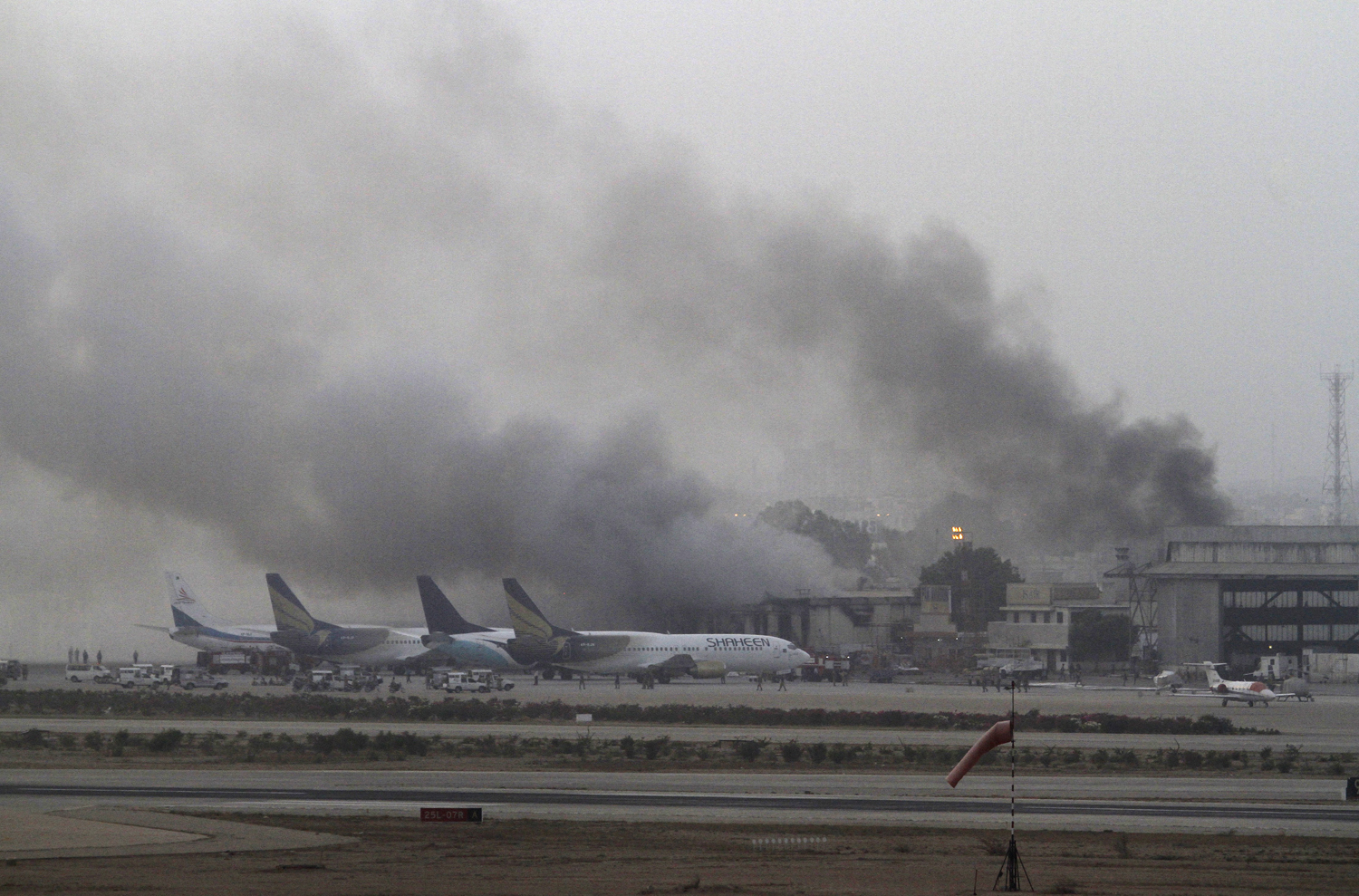 Smoke billows from Jinnah International Airport in Karachi