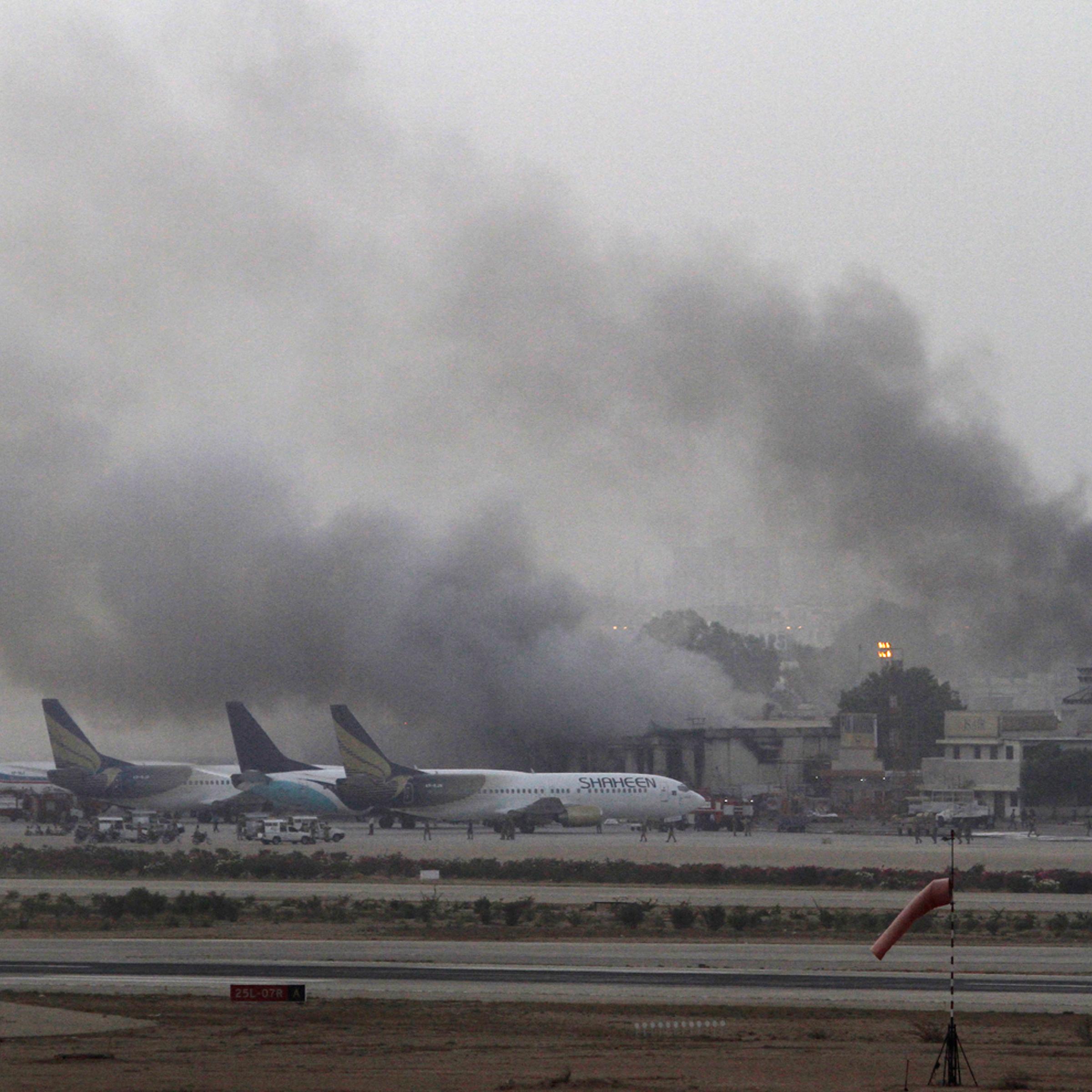 Smoke billows from Jinnah International Airport in Karachi
