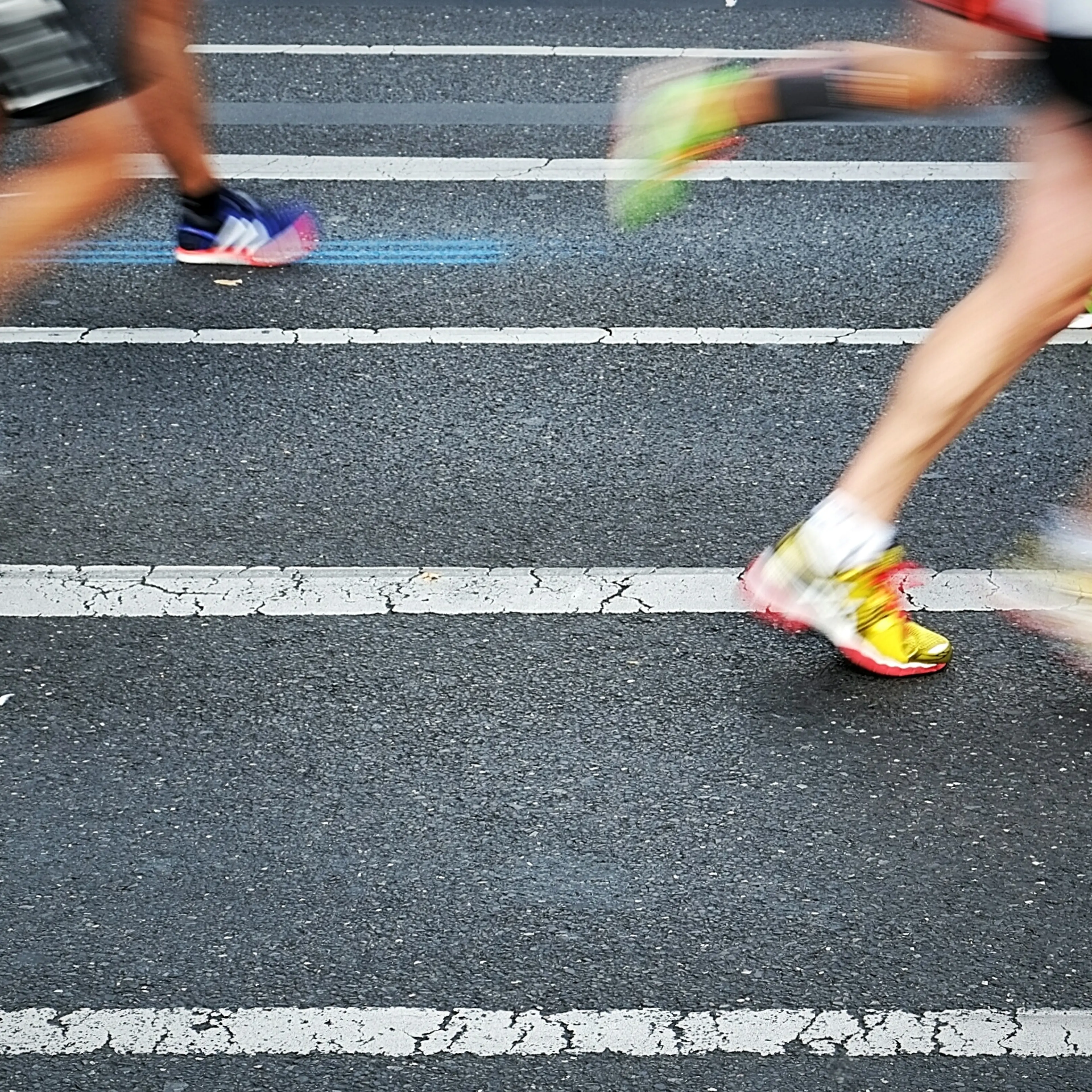 Low Section Of People Running In Marathon