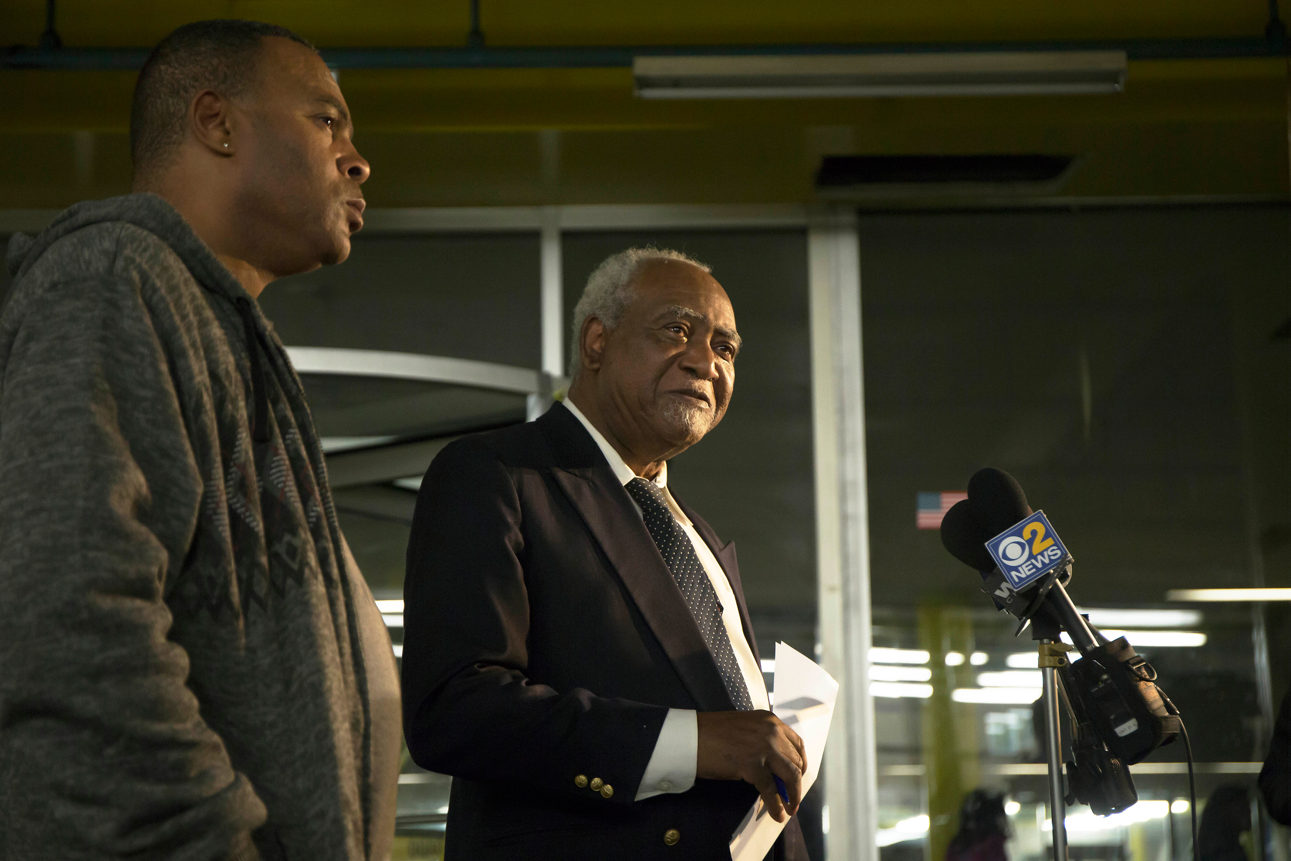 In this Friday, Nov. 18, 2016 photo, U.S. Rep. Danny Davis, D-Ill., center, and his son, Stacey Wilson, give a news conference at the 5th District police department in the Englewood neighborhood of Chicago. Fifteen-year-old Javon Wilson, the grandson of 